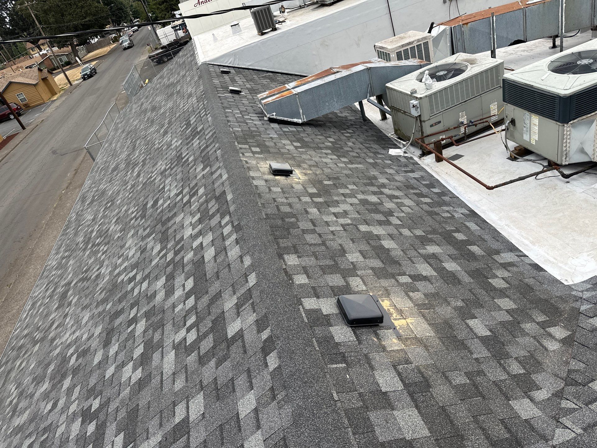 Summit Grey Lum Yun Salem Oregon Commercial Roof by Orezona Building & Roofing Company, Inc.
