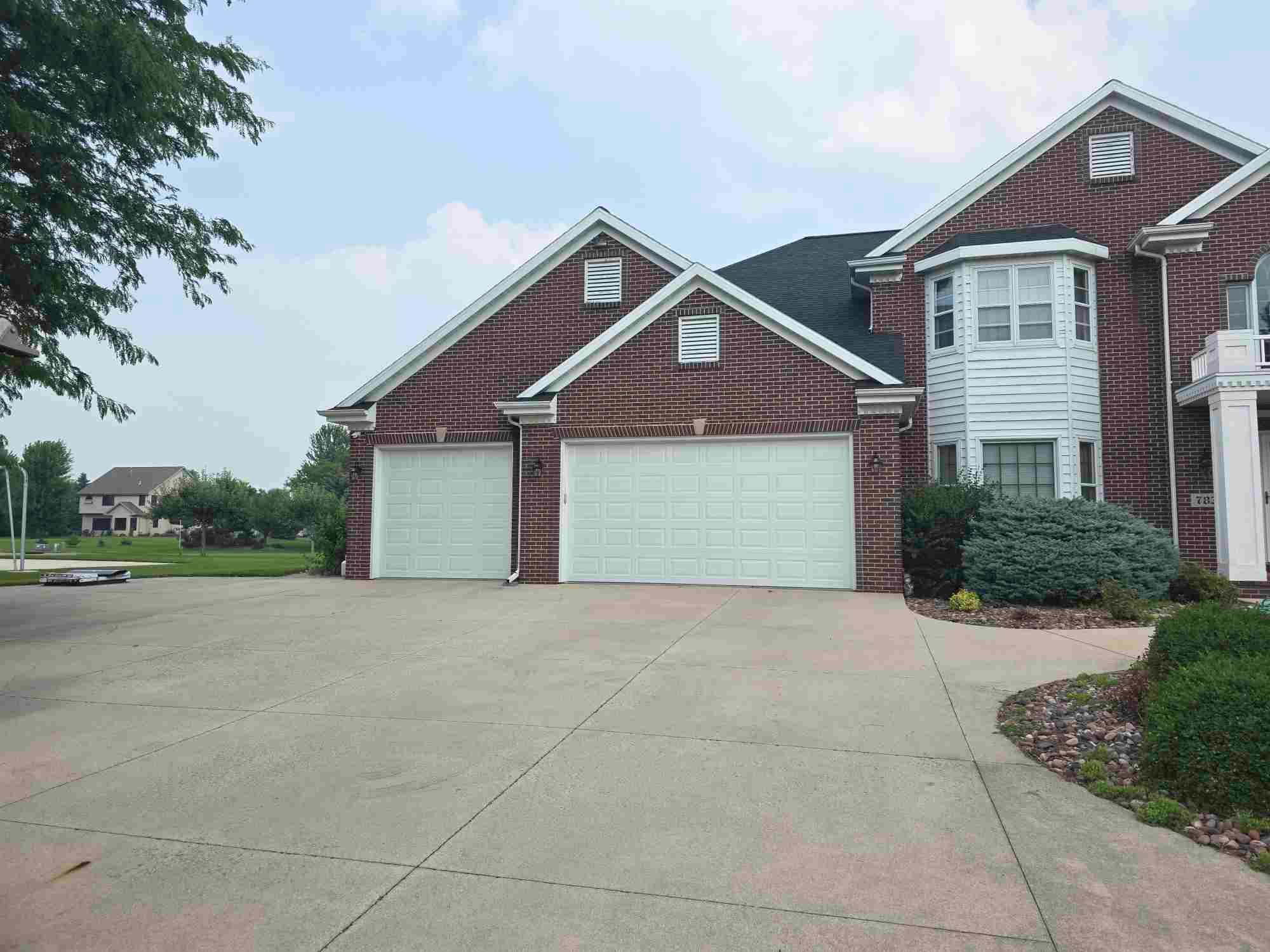  Country Club Lane Brick Home   by Gellings Roofing & Siding
