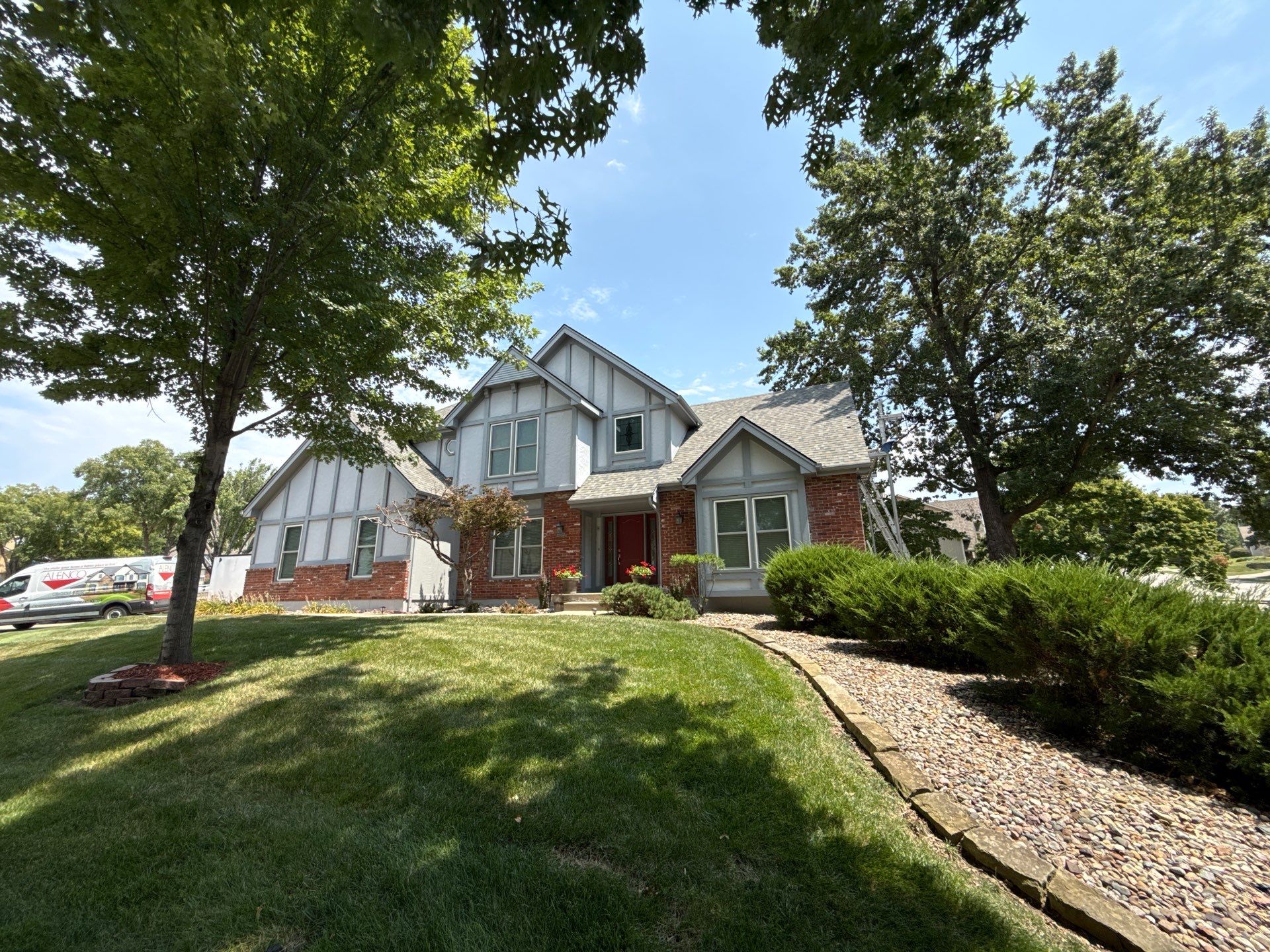 Whole Home Siding Replacement and Gutter Installation in Gladstone by EEC  Windows, Siding & Roofing 