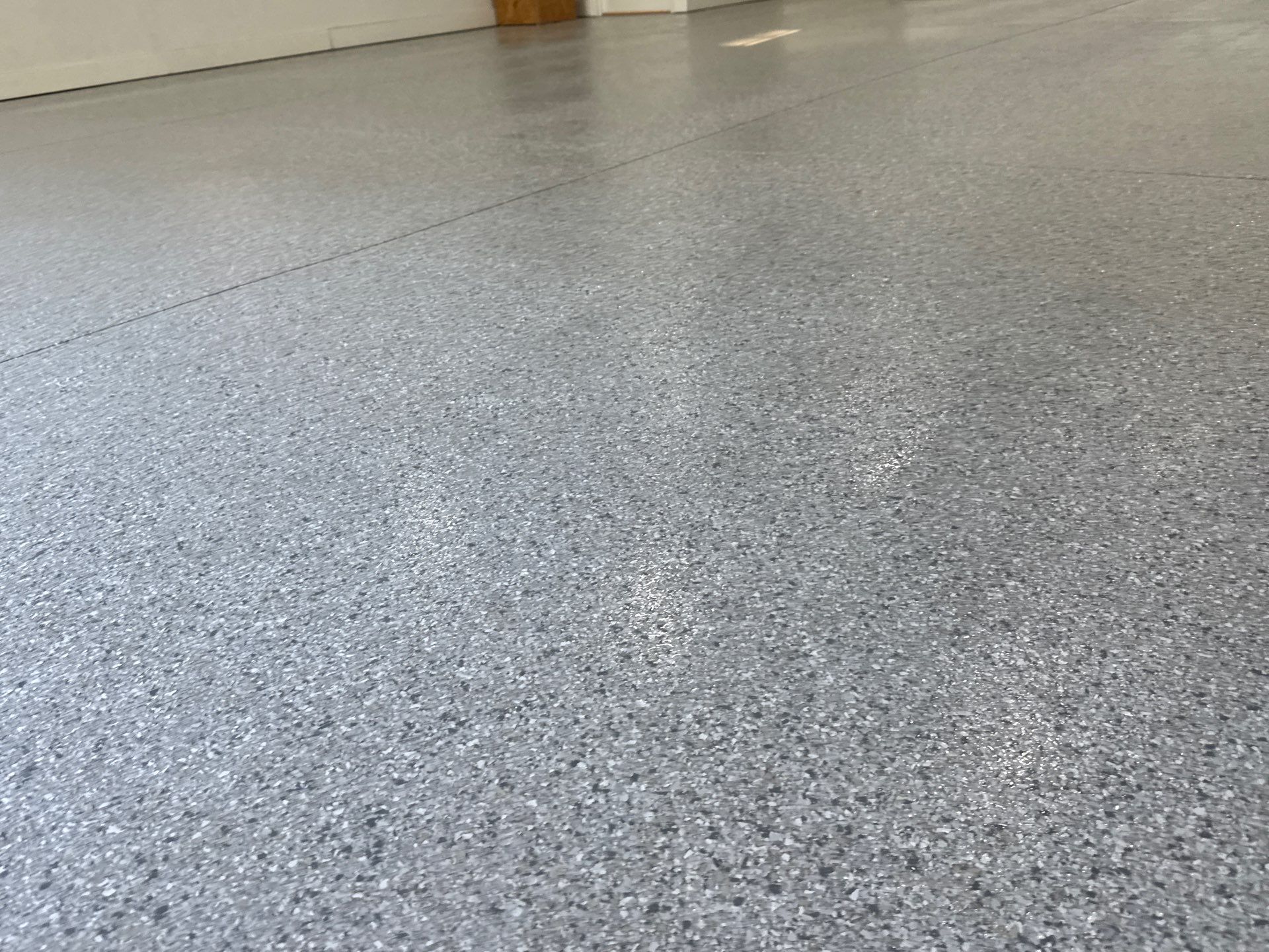 Garage Project in Mount Everest by Cross Creek Concrete Coatings