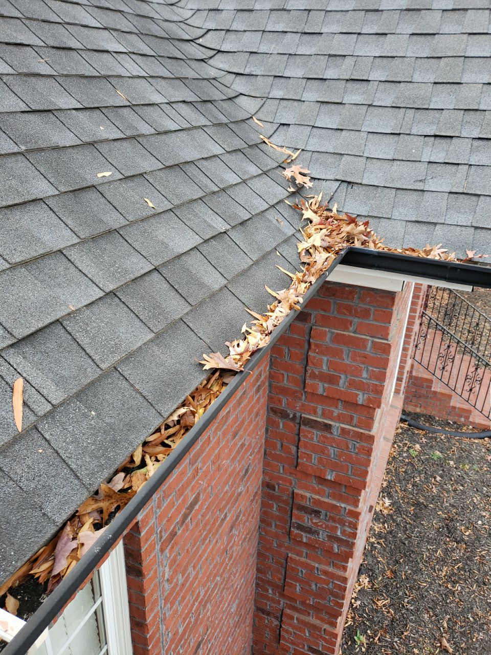 Gutter Cleaning using water by Power Wash Masters LLC