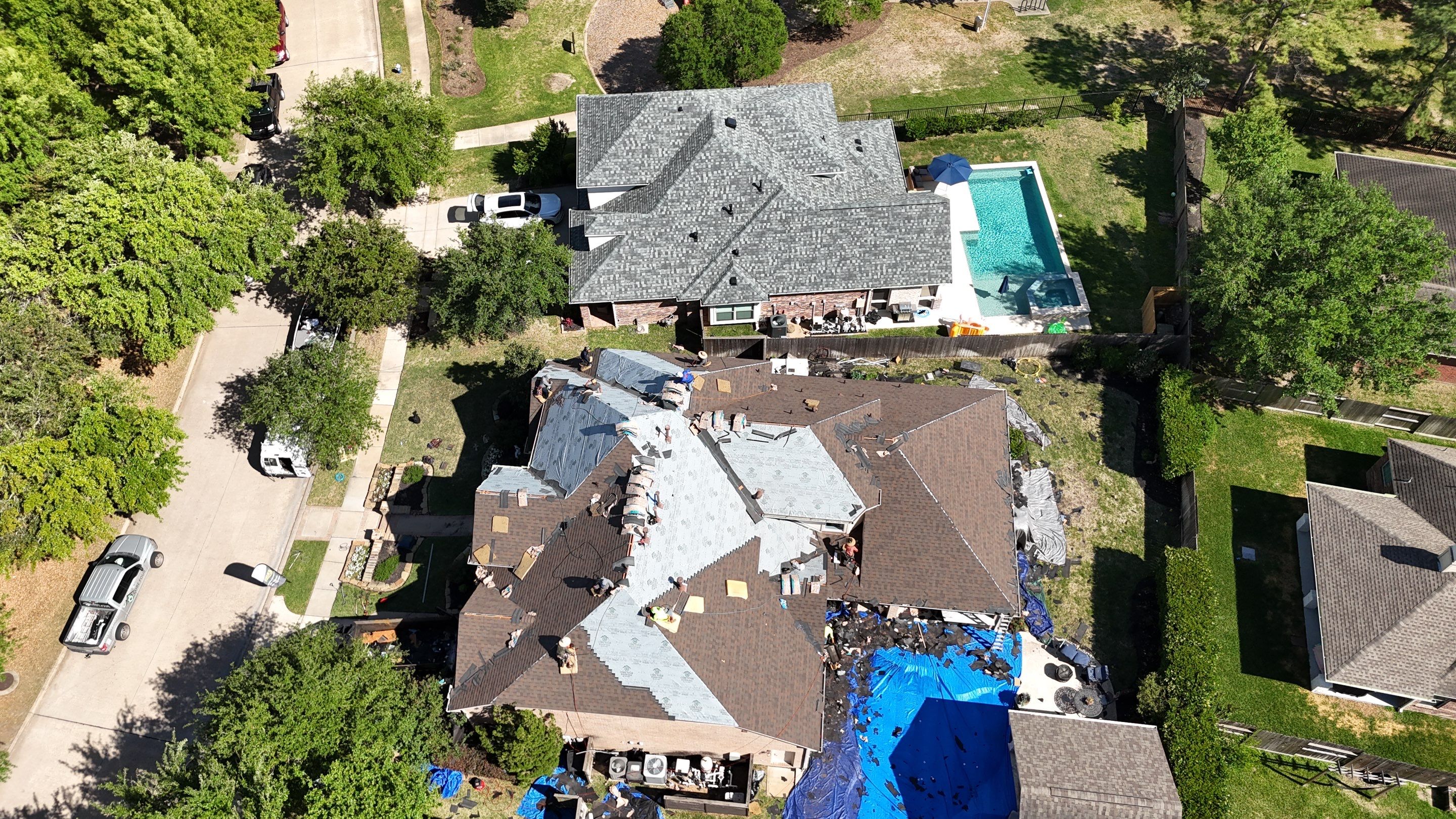 Residential Roofing Installation of 2 neighbors in Bridgeland by Core Four Roofing