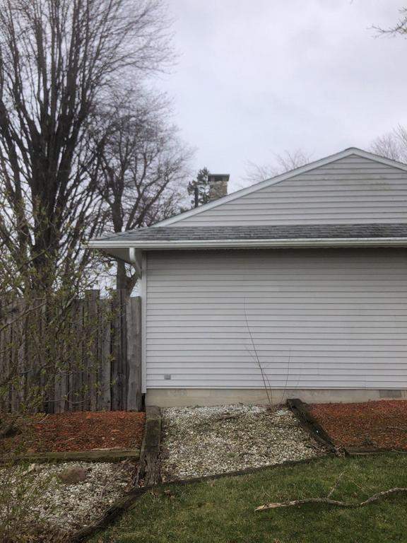 Storm damage roof replacement by Nitro Roofing and Construction