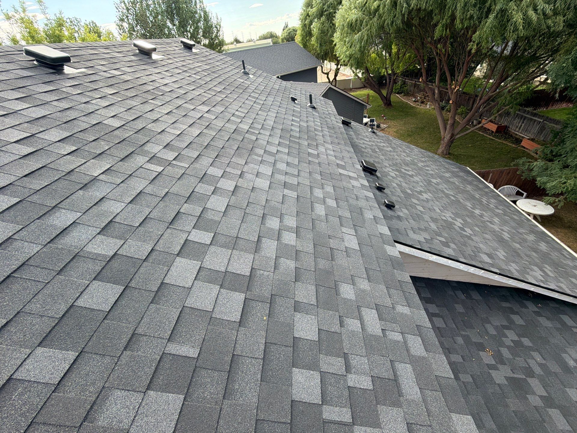 Residential Roof Replacement in Meridian Featuring Charcoal Architectural Shingles by Olive Roofing