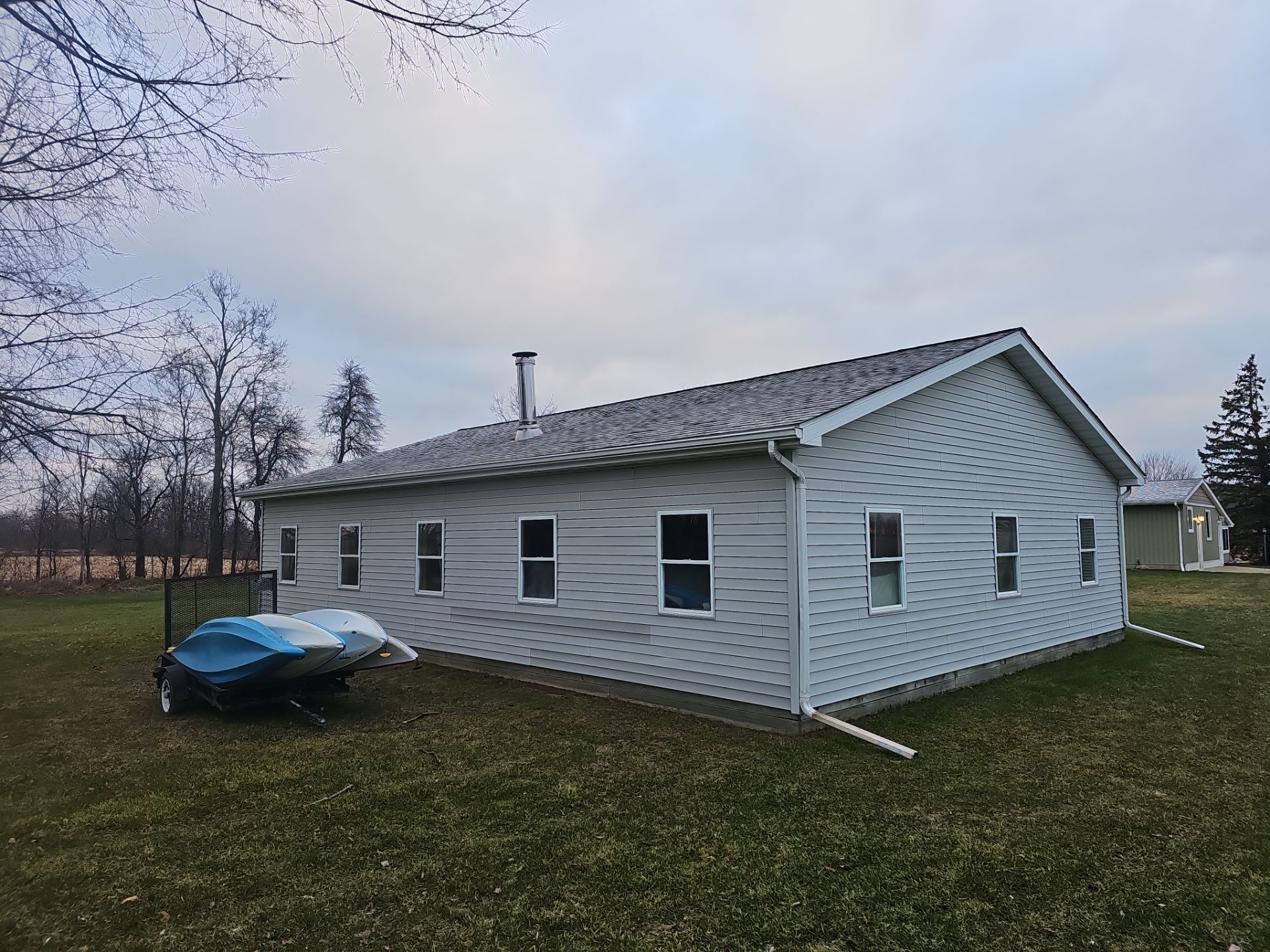 Cypress Siding and New Gutters by 42 North Construction, LLC.