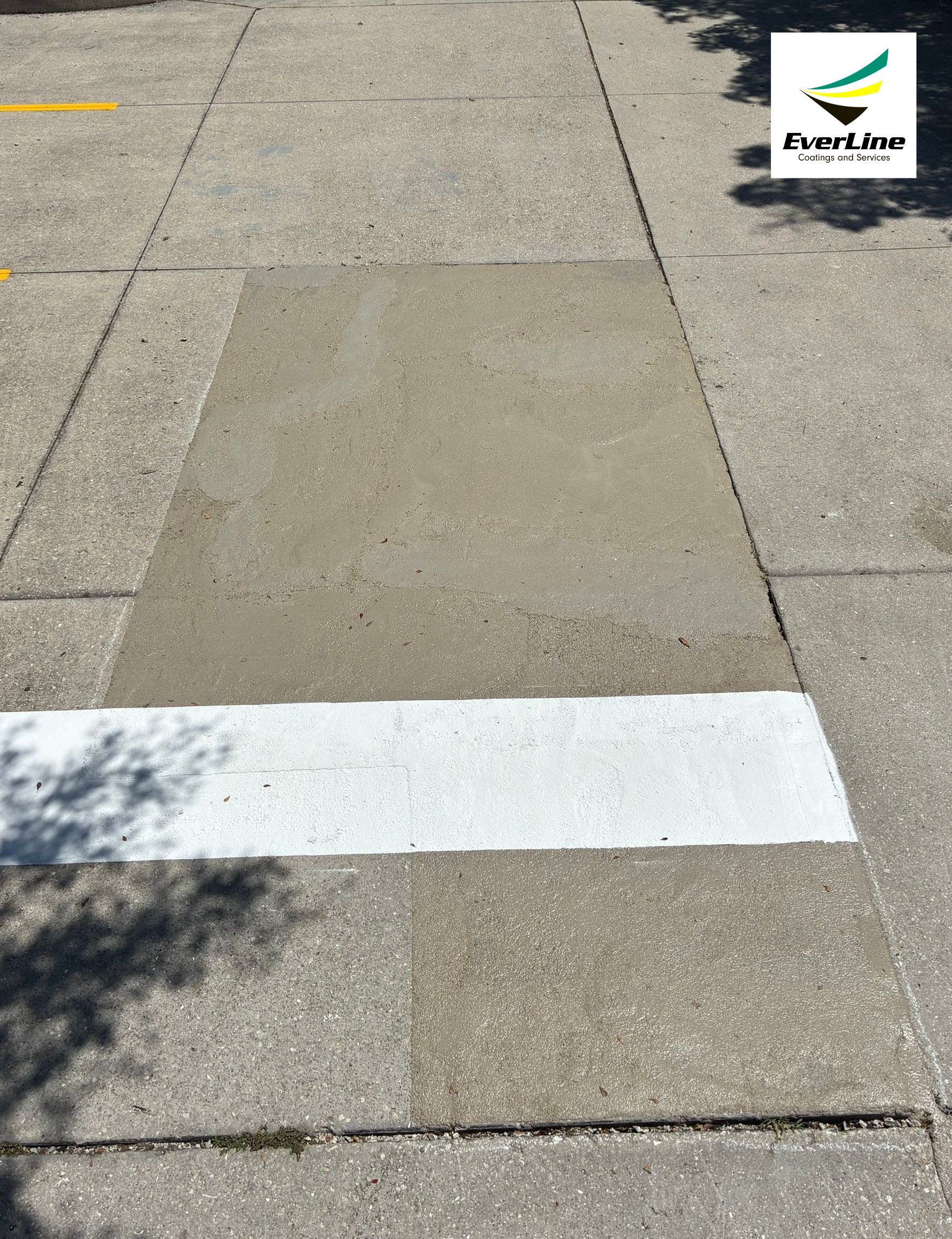 Line Striping and Concrete Pothole Repair at the Sarasota Chamber of Commerce by Everline Coatings & Services - Southwest FL