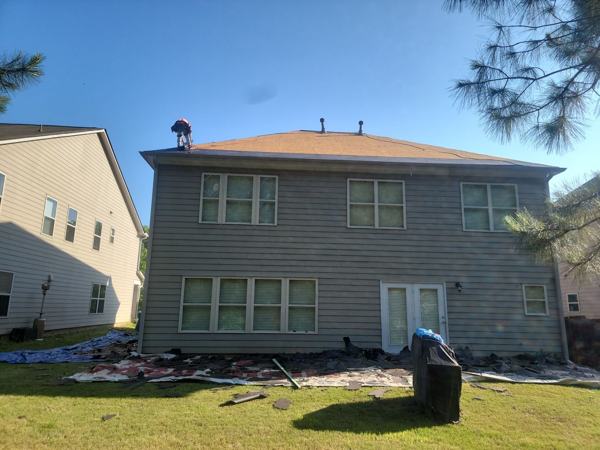 Residential Roof Replacement using Owens Corning TruDef Driftwood by Inspector Roofing and Restoration