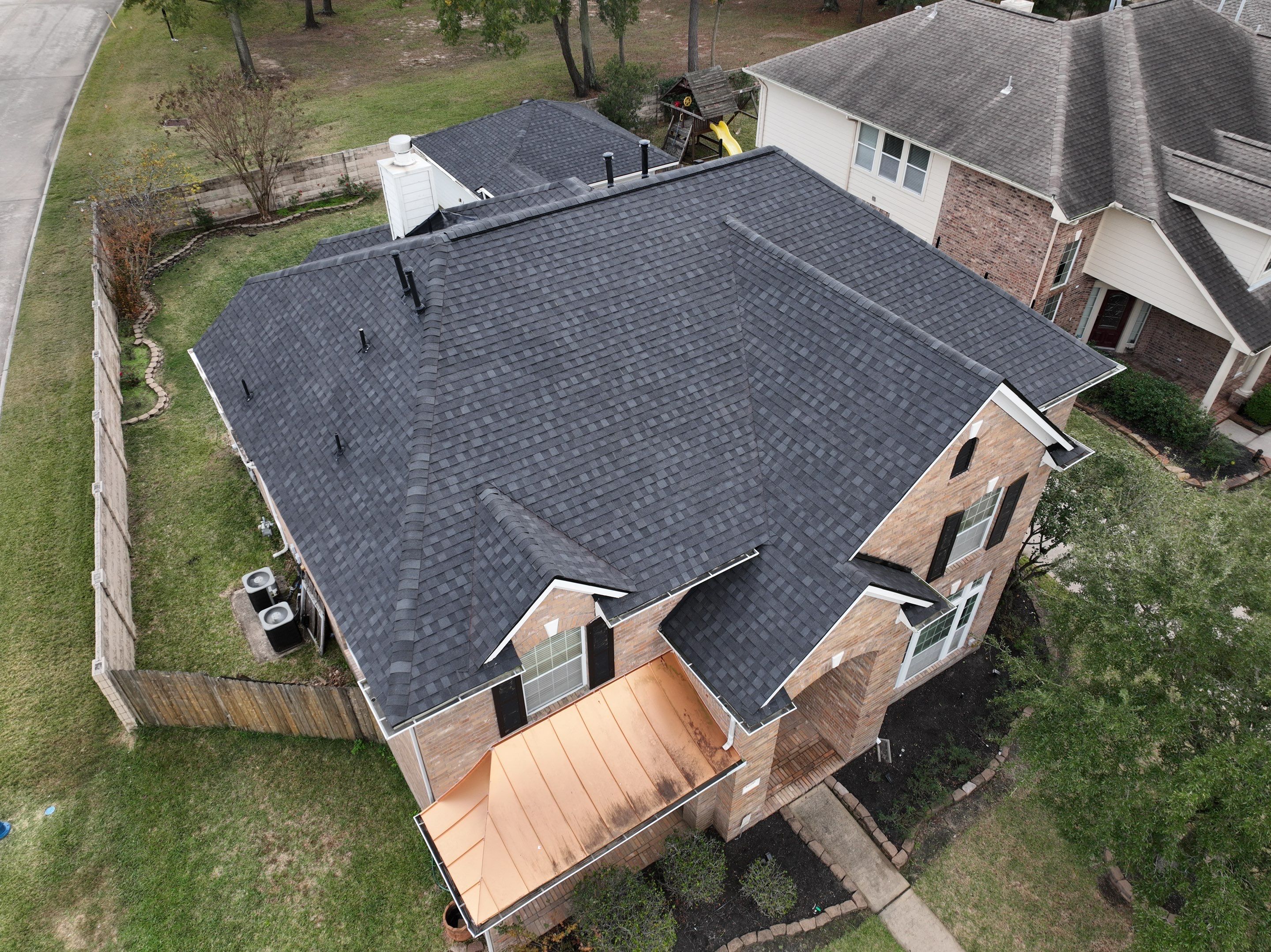Tamko Titan XT - Rustic Black by Roof Concepts Construction