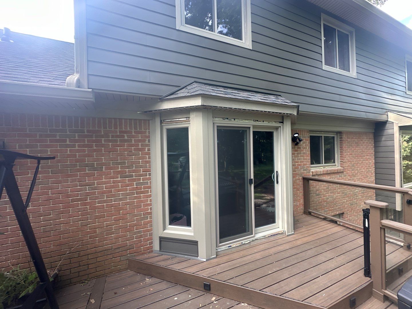 Roof Replacement using Owens Corning Peppercorn and Siding Replacement using Ascend Charcoal Smoke by 180 Contractors