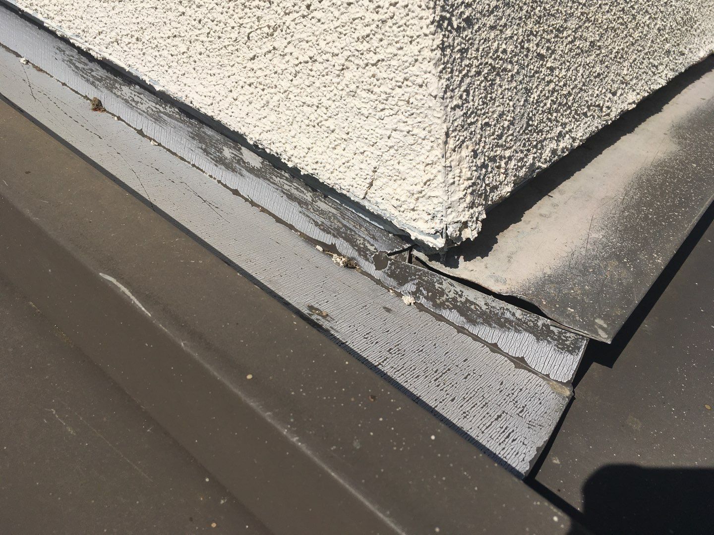 Spray foam and coatings inside commercial building HVAC well using Spray foam and coatings over existing BUR system by Straight Edge Roofing Inc