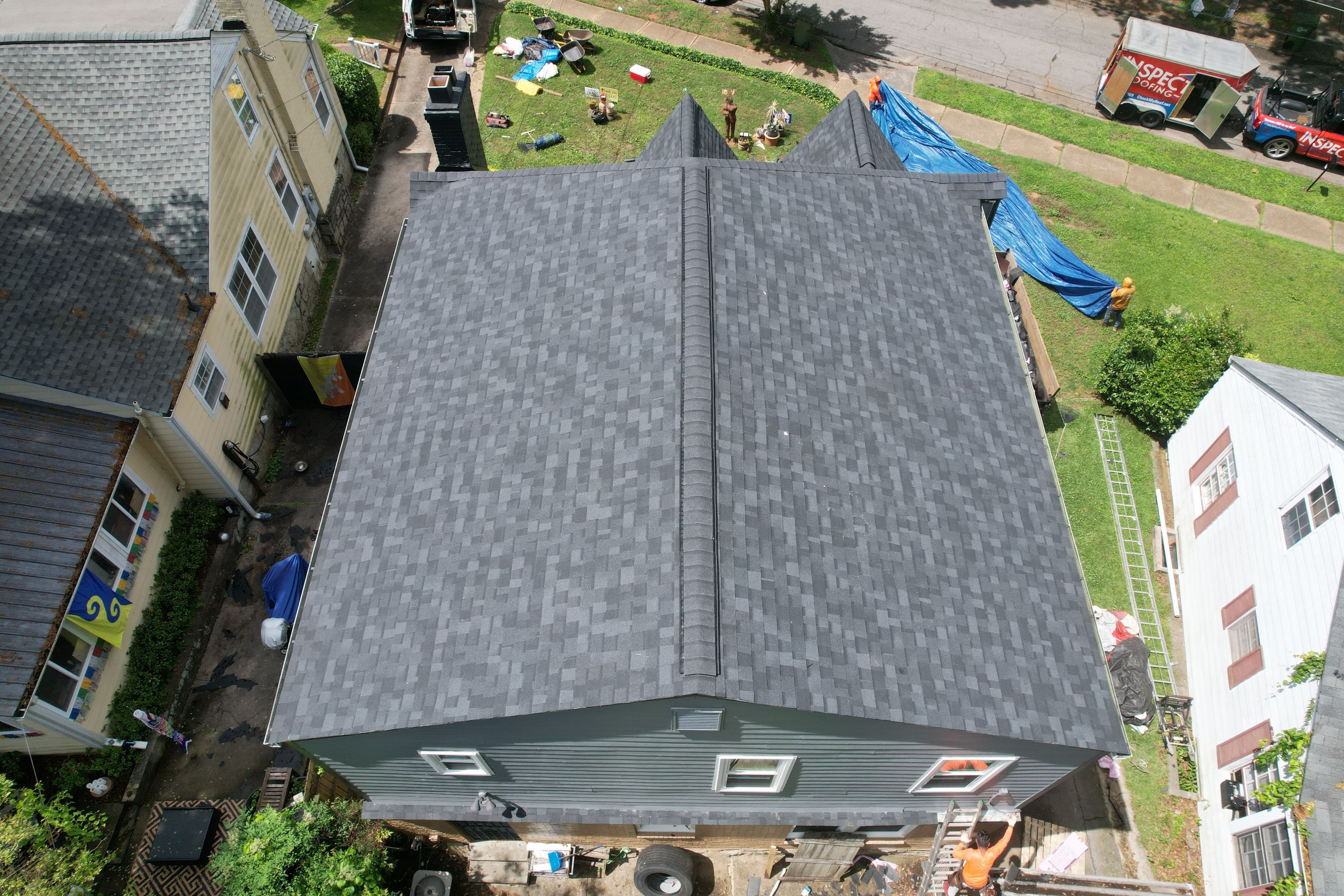 Residential Roof Replacement using Owens Corning Trudef Twilight Black by Inspector Roofing and Restoration