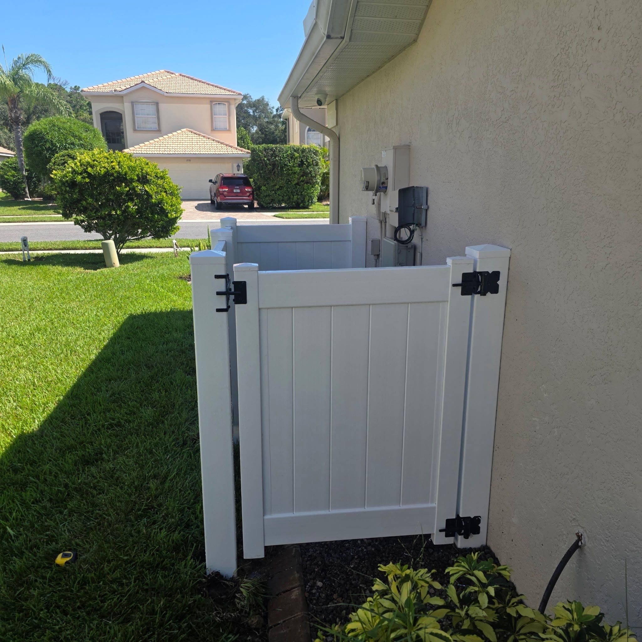 White Vinyl Utility Enclosure and Privacy Gate in Venice by True Fence LLC