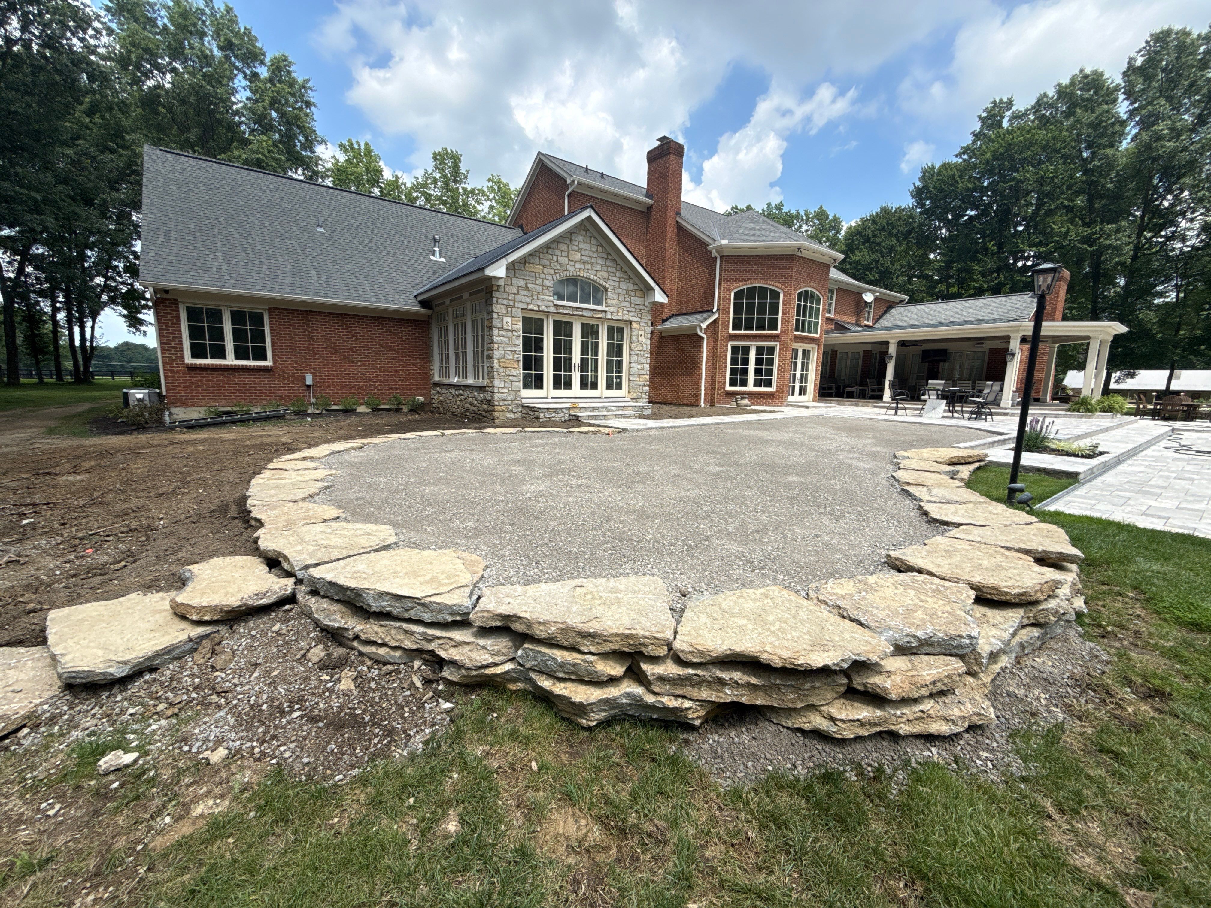 Custom Backyard Golf Green Accented by Flagstone Border in Morrow, OH by Southwest Greens Midwest