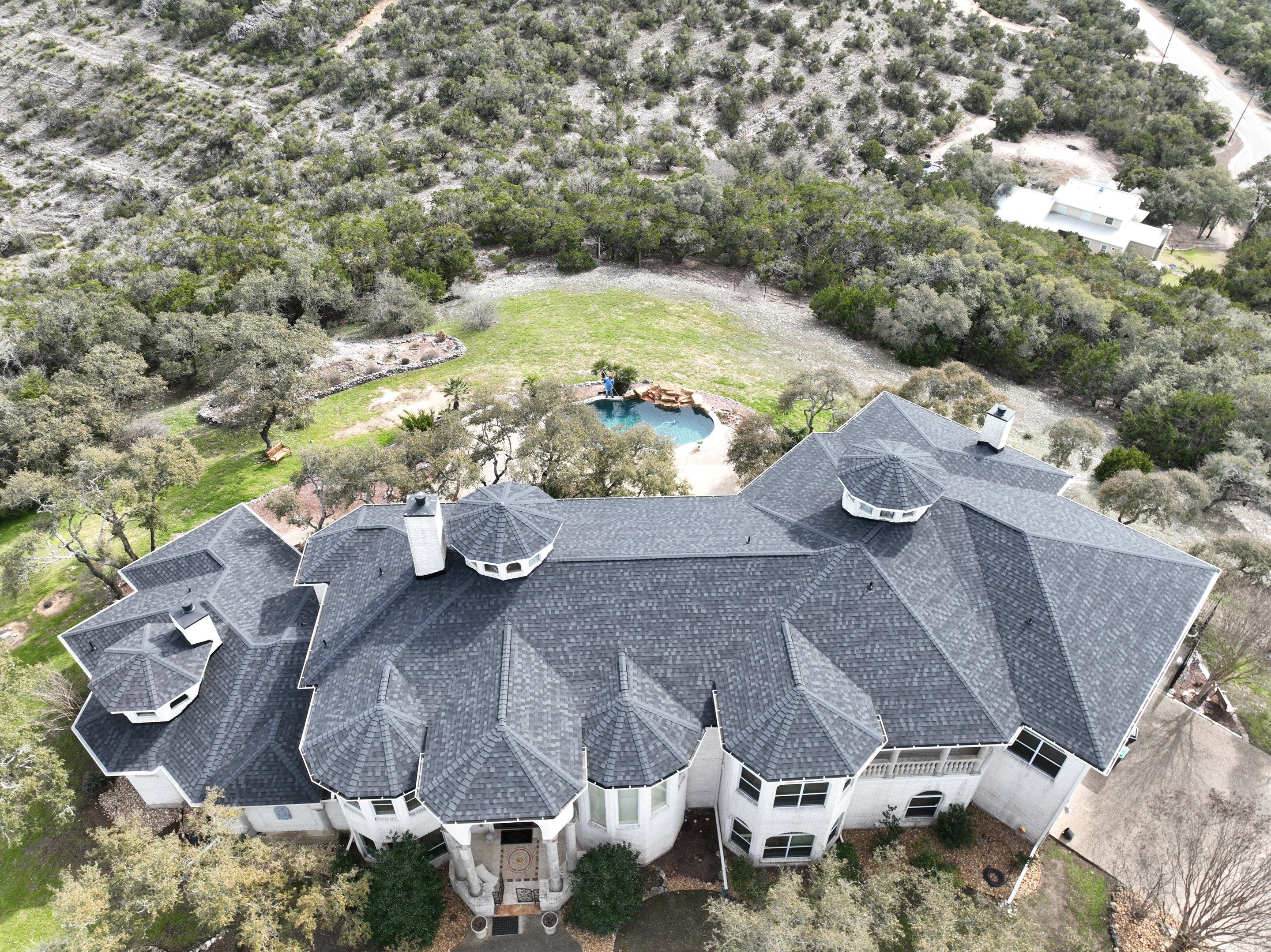 Residential Roof Replacement using 30 Year Laminate Shingles with High Profile Ridge by Premier Roofing and Contracting