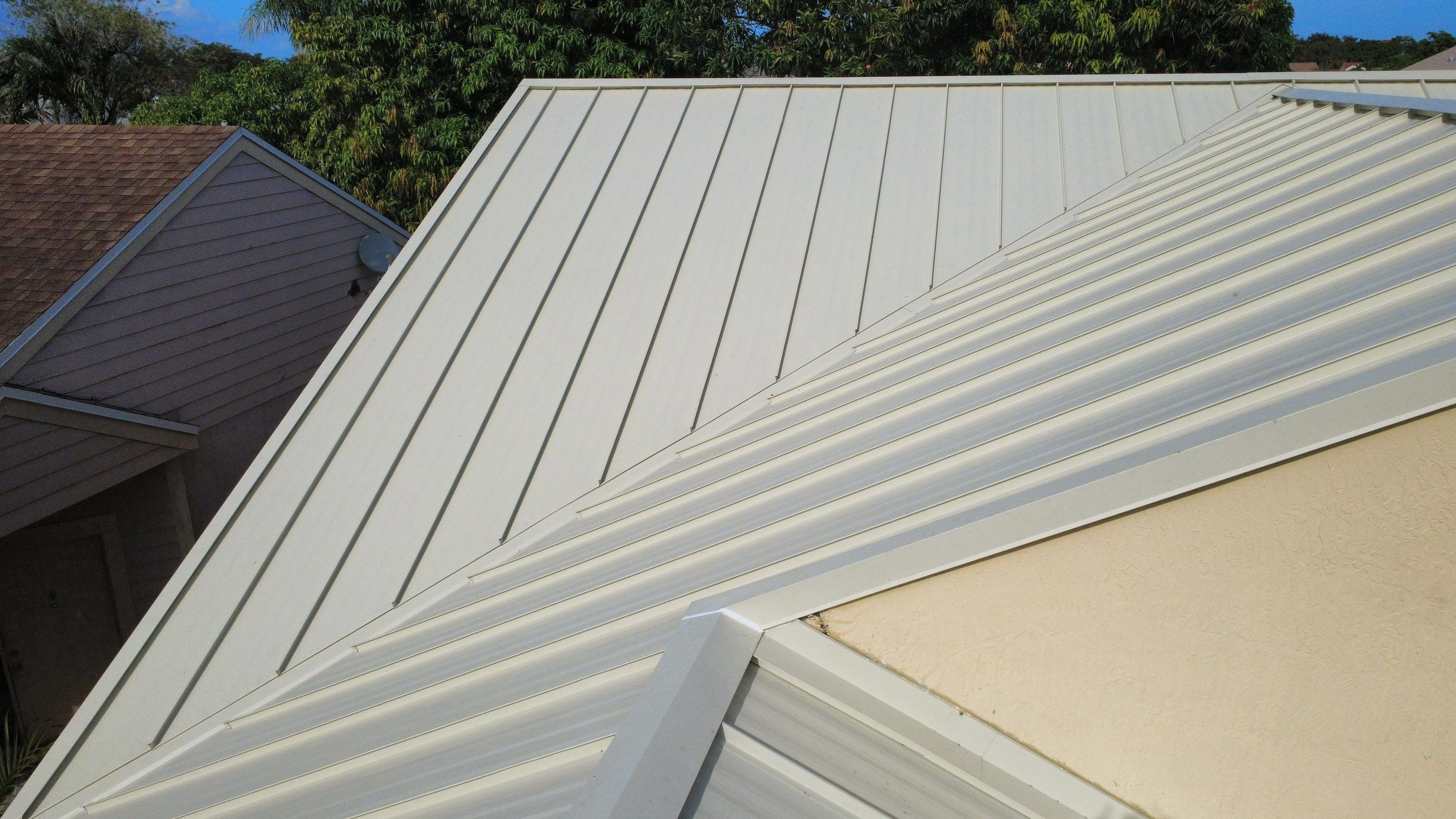 Residential Roofing Installation using 1.5'' Mechanical Seam by BLUES BROTHERS ROOFING