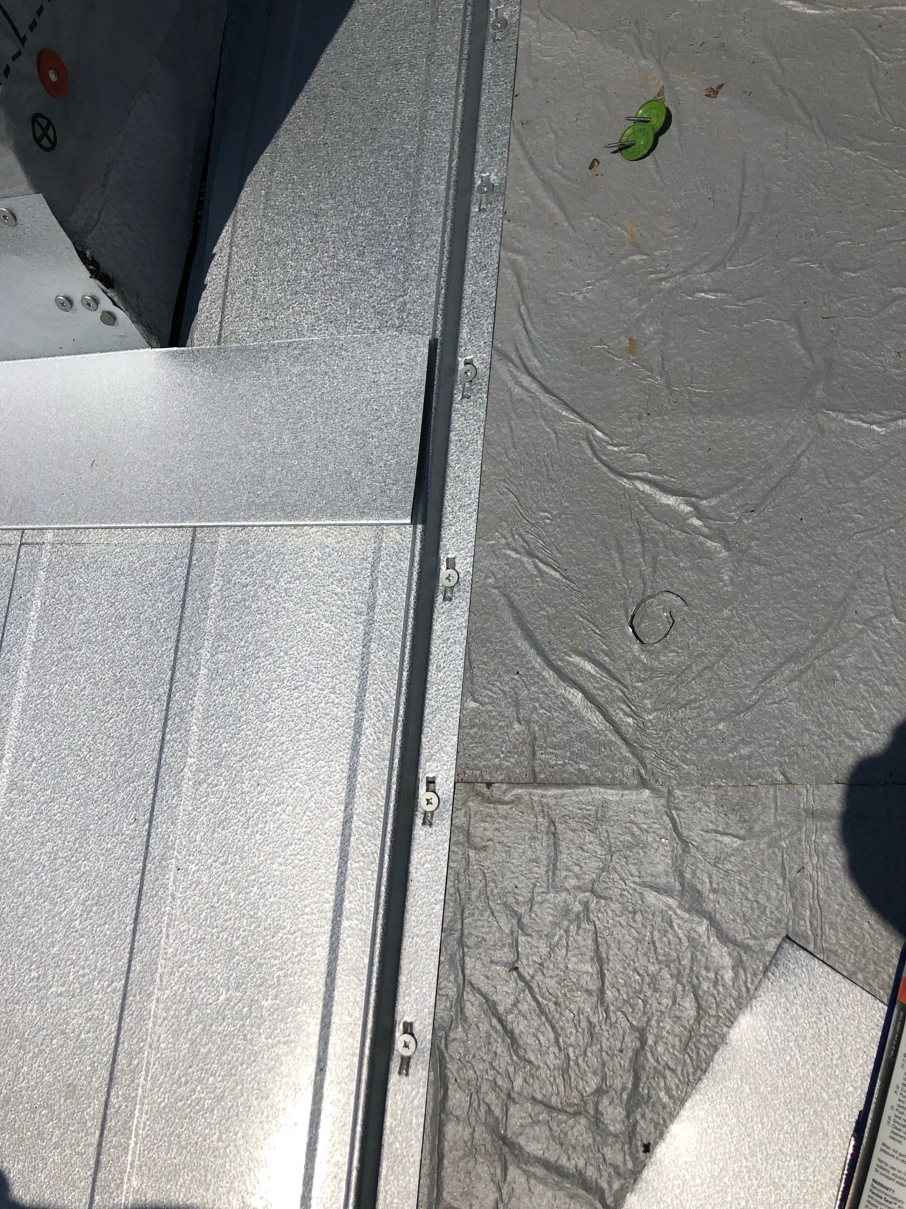 Residential Roofing Installation using Metal roofing by American Roofing & Construction LLC
