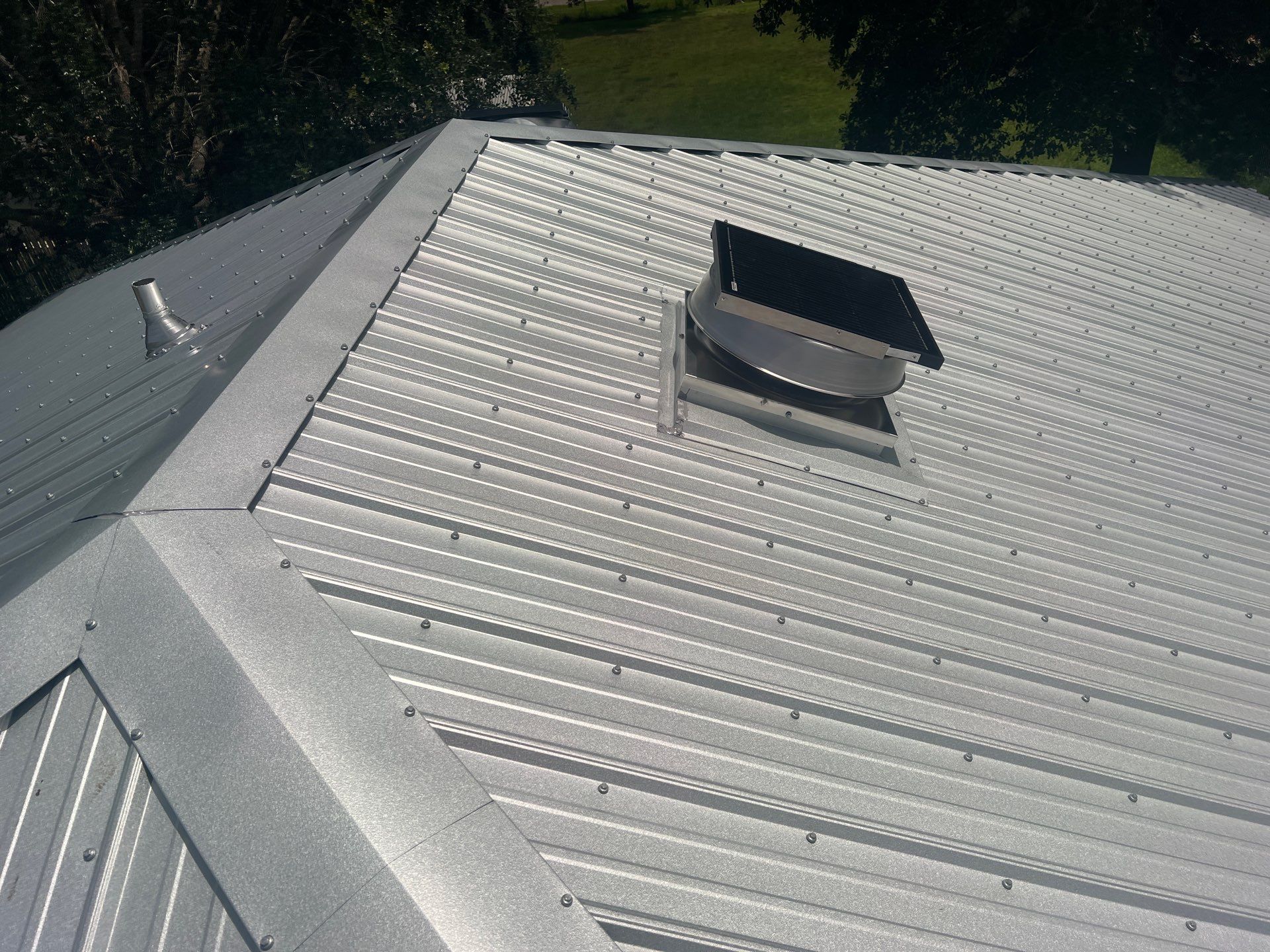 Residential Roofing Installation using Galvalume Classic Rib by Durabilis Roofing INC