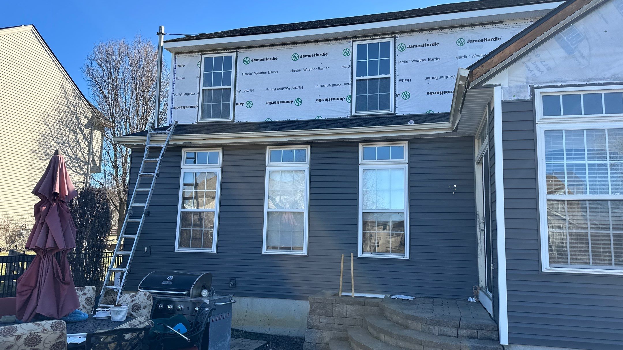 Roofing & Siding  by Tamlin Roofing