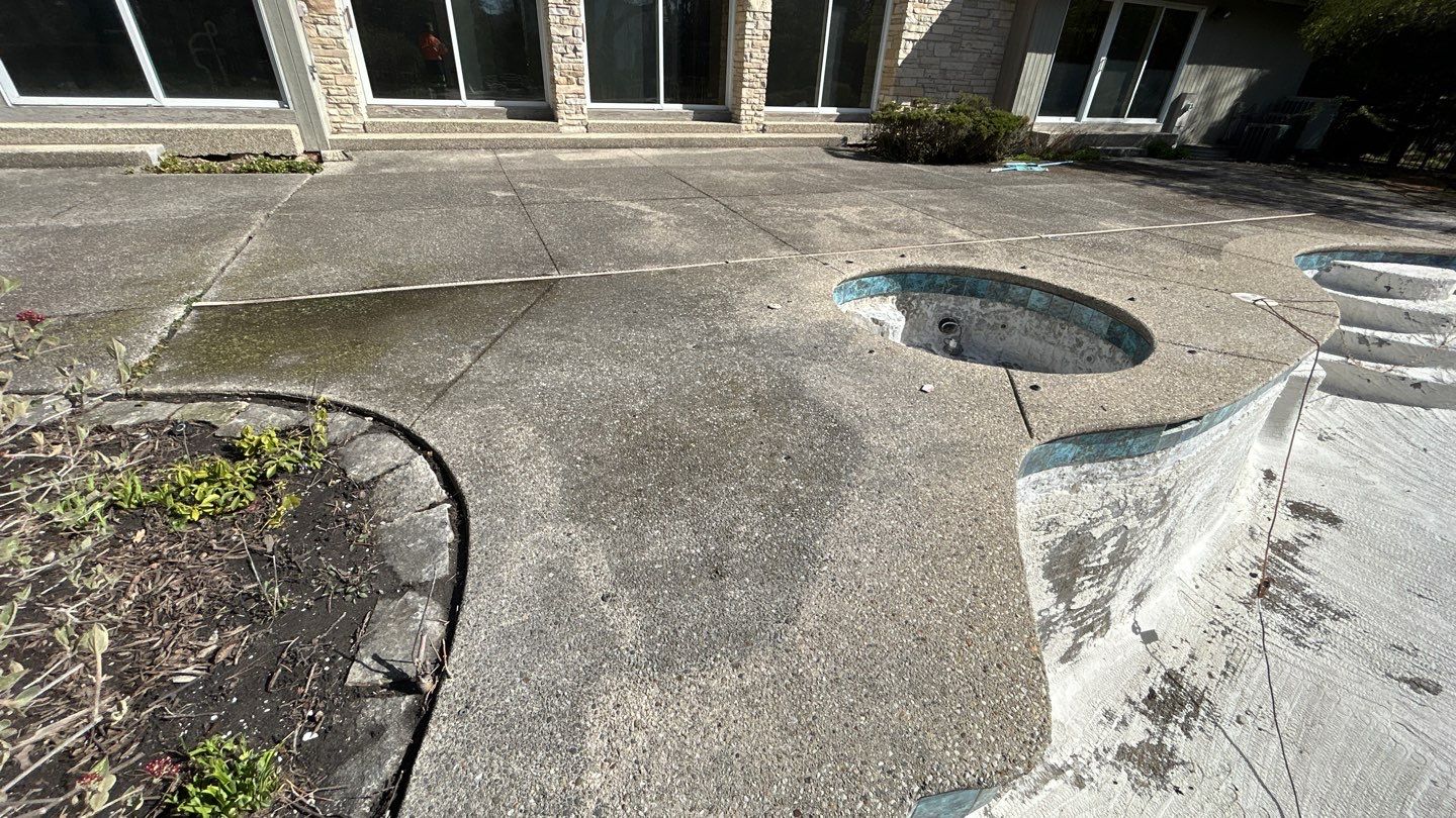 Aggregate Clean and seal using low gloss sealer by Northern Power Washing LLC.