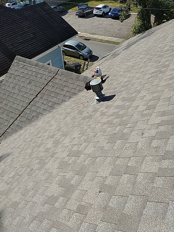 Residential Roofing Installation using Roof Replacement by American Roofing & Construction LLC