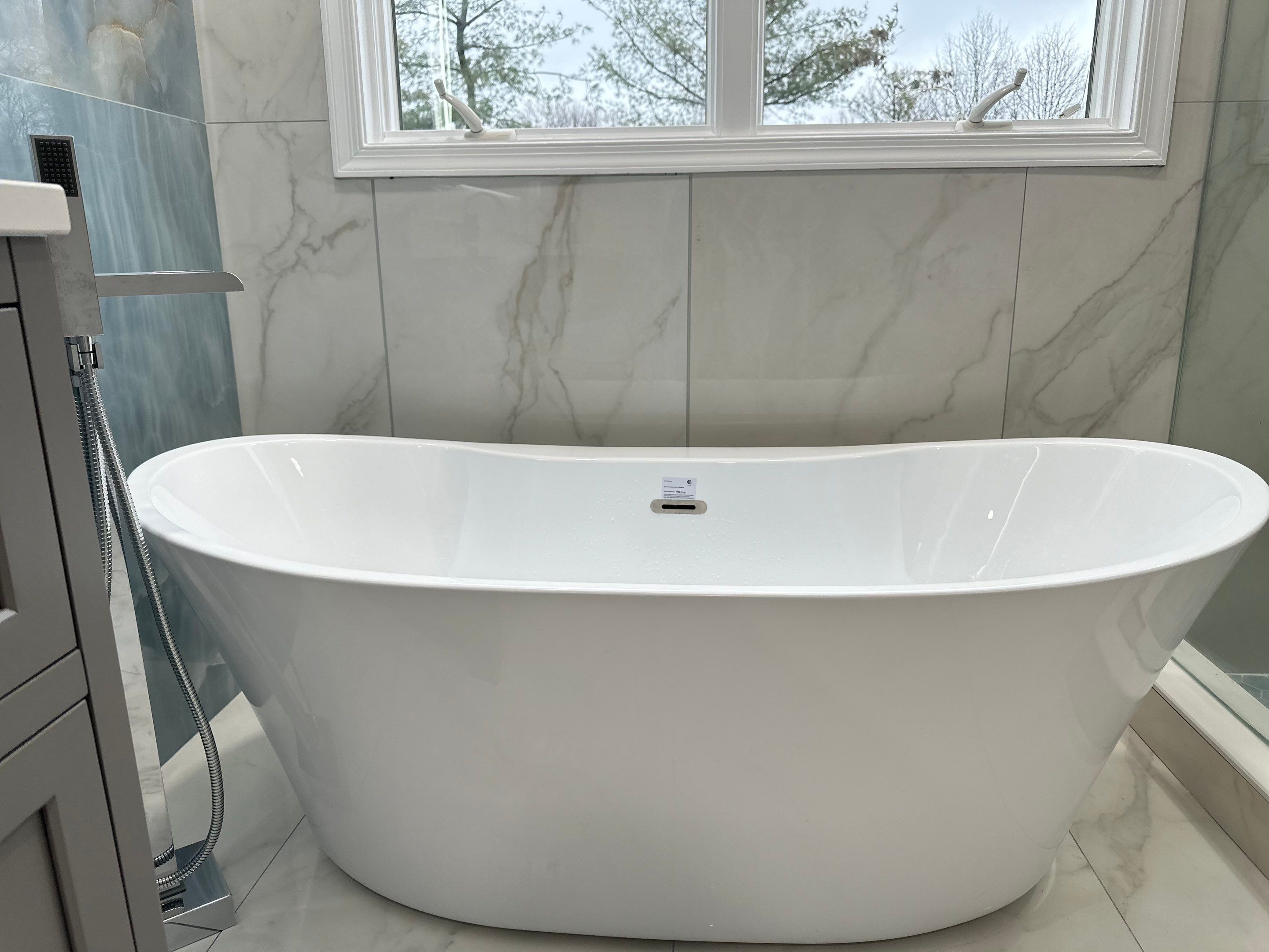 Bathroom Remodel using Tile by Home Concepts Construction