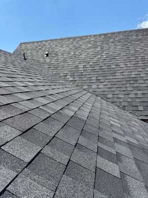 Residential Roof Replacement Featuring Charcoal Grey Architectural Shingles