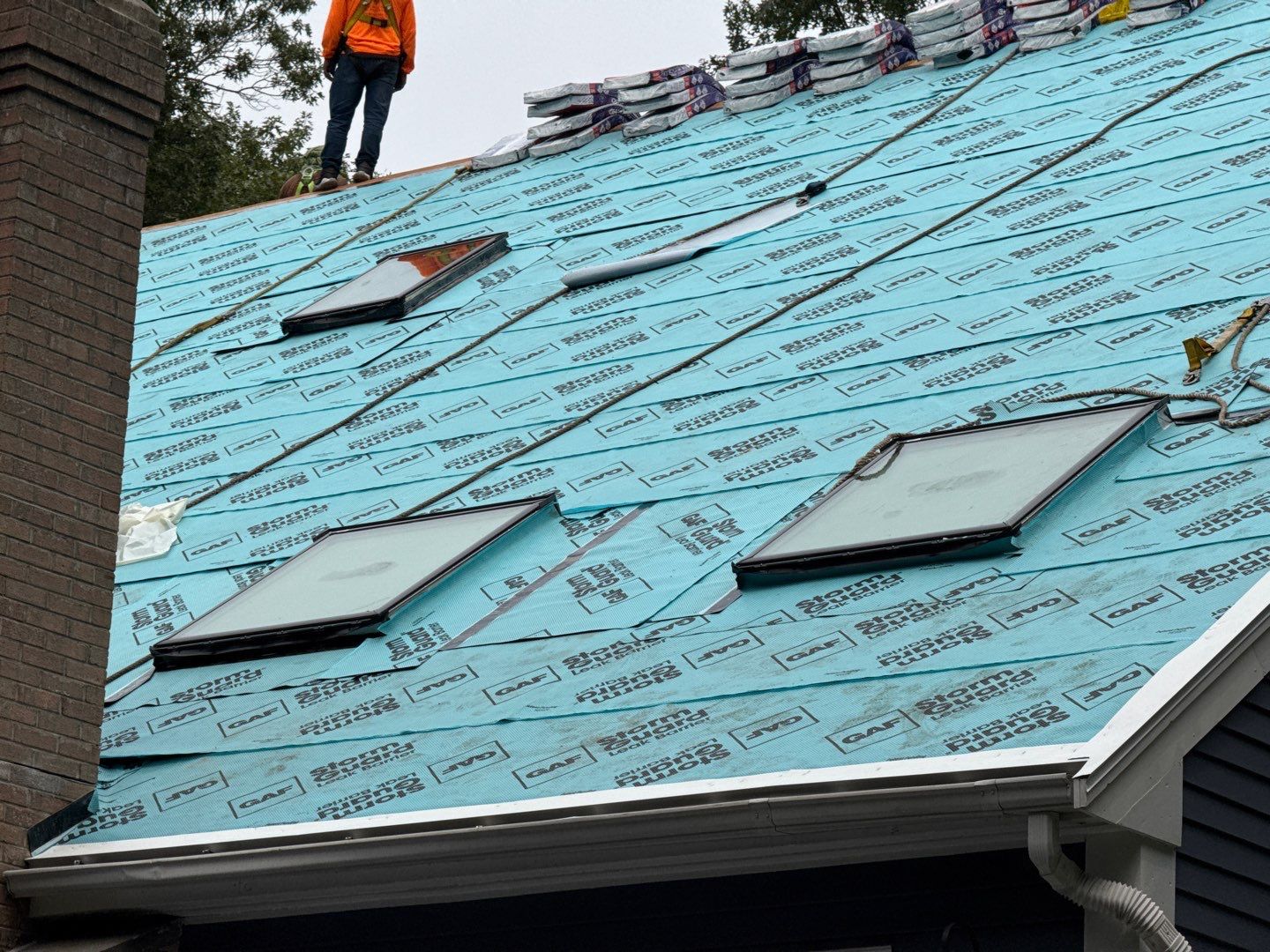 Solar-Ready Roof Replacement with GAF Pewter Gray Shingles & VELUX Skylights by Sensible Home Solutions