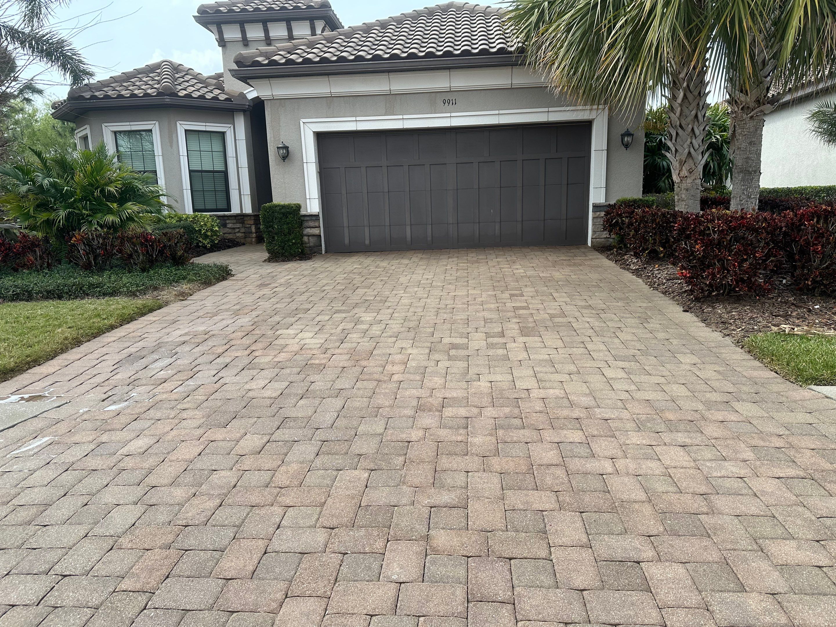 Concrete Tile Roof, Paver Pool Deck, Screen Enclosure & Driveway Cleaning in Artisan Lakes Esplanade, Palmetto, FL | Sunshine AquaWash by Sunshine AquaWash