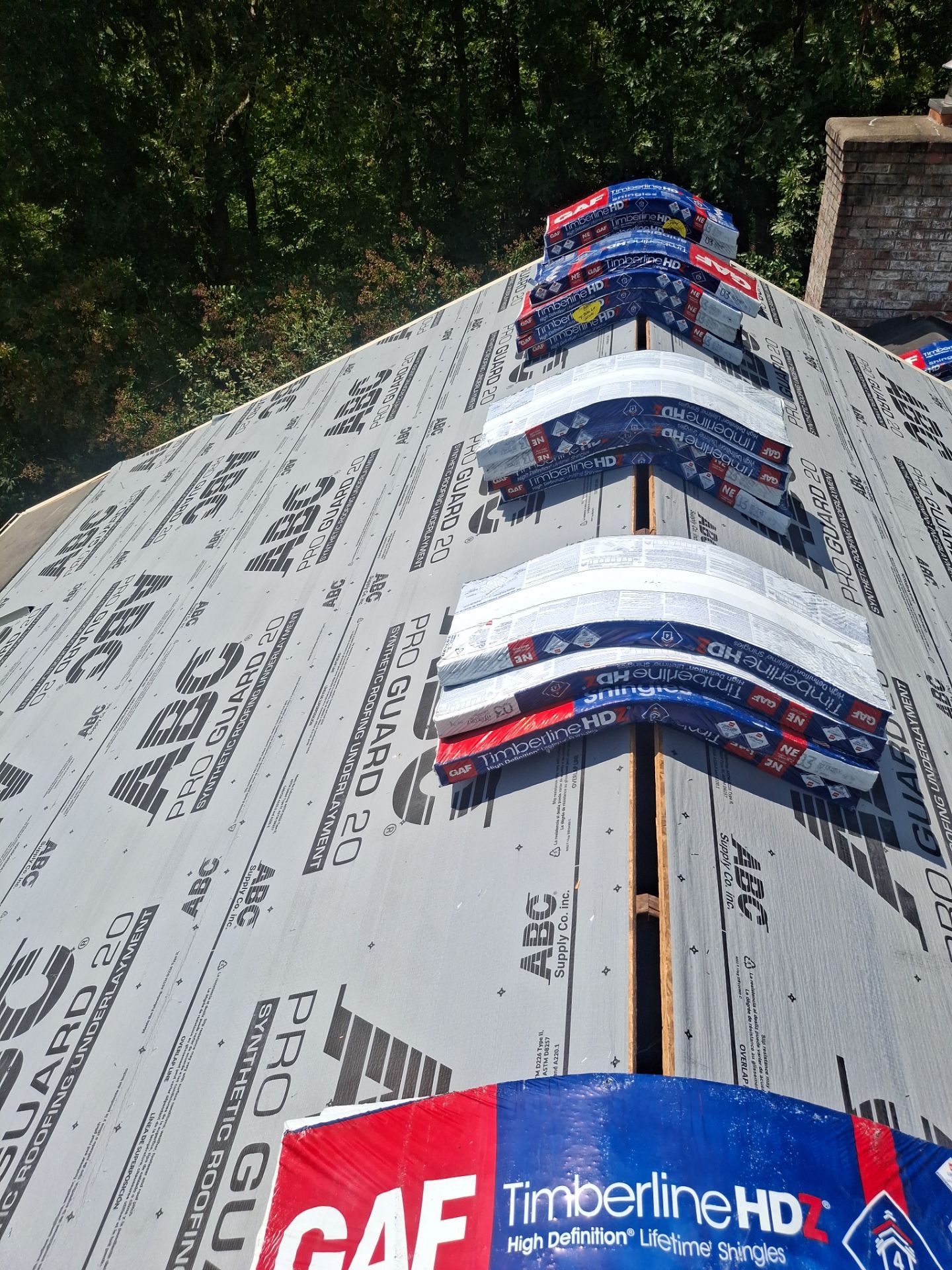 Residential Roofing Installation using GAF TImberline HDZ Hickory by Rainstoppers Roofing
