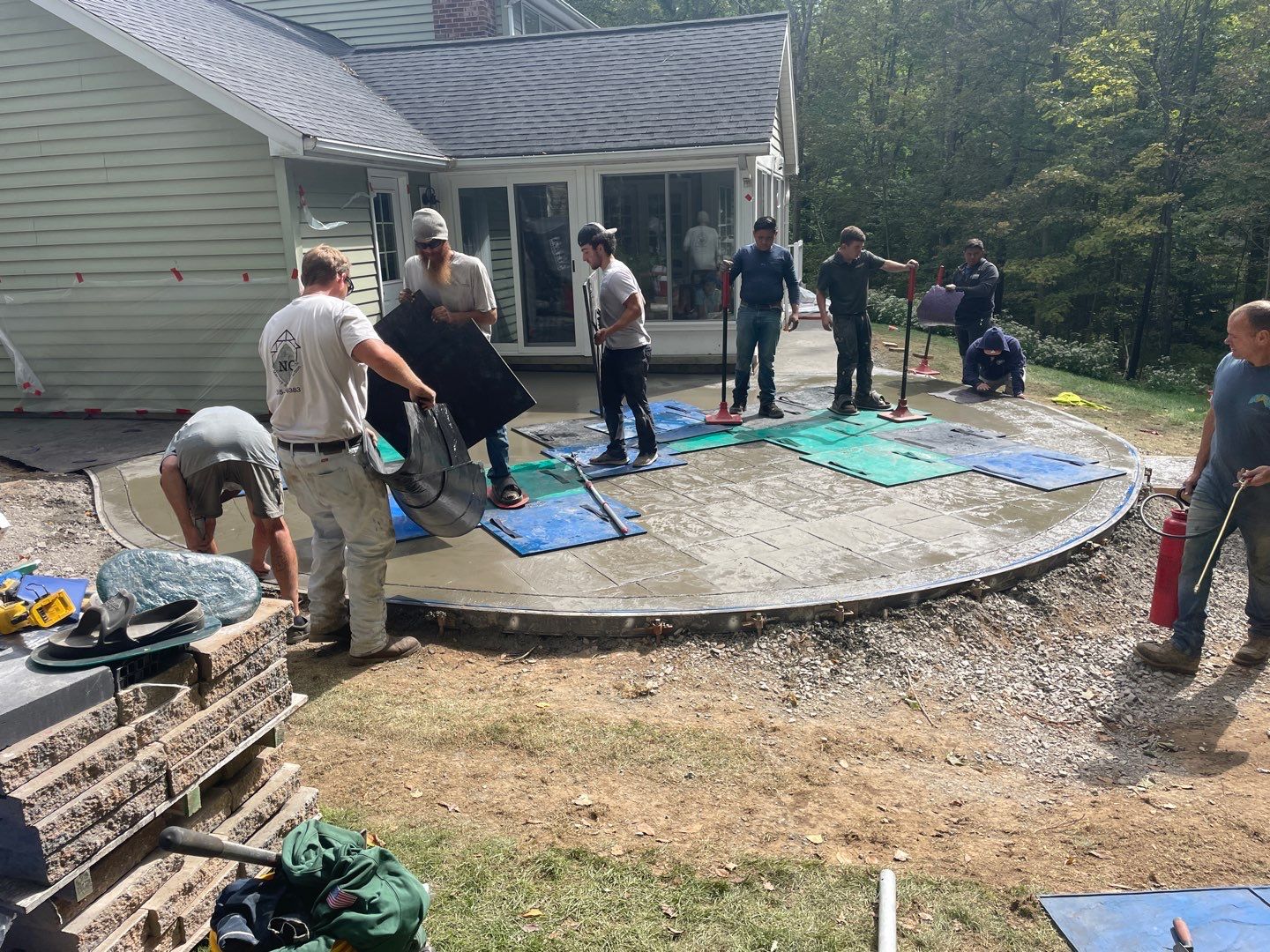 Majestic Ashlar stamped concrete patio by NG Masonry & Construction LLC