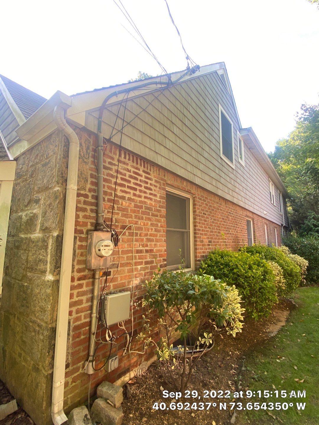 Gutter Installation using 5"white K style seamless gutters and 2x3 white leaders, and Microguard gutter shields installed.  by Above All Gutters 