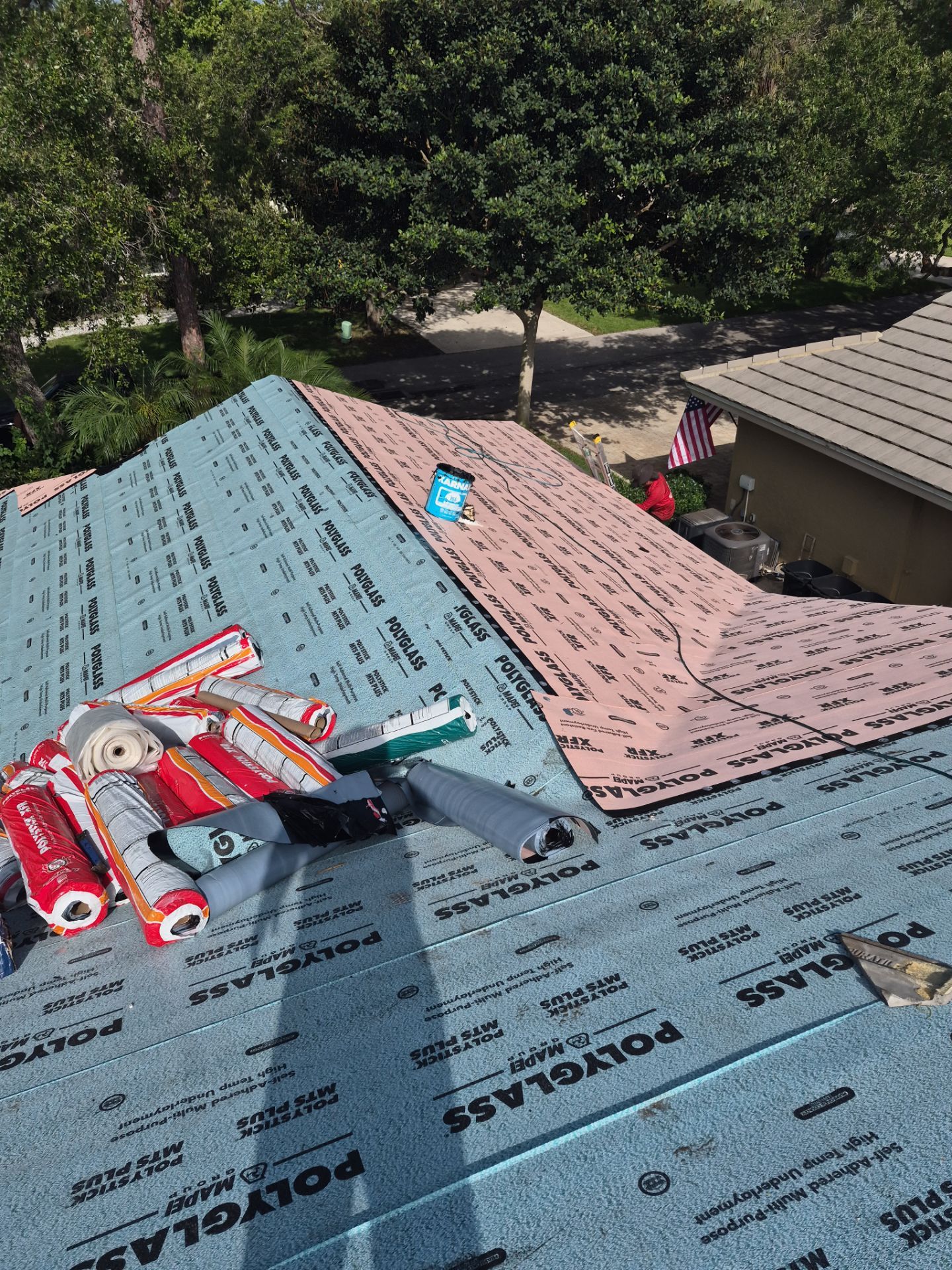 Standing Seam Metal Charcoal Grey Roof Replacement and Skylight Installation in Jupiter by Art's Roofing & Construction