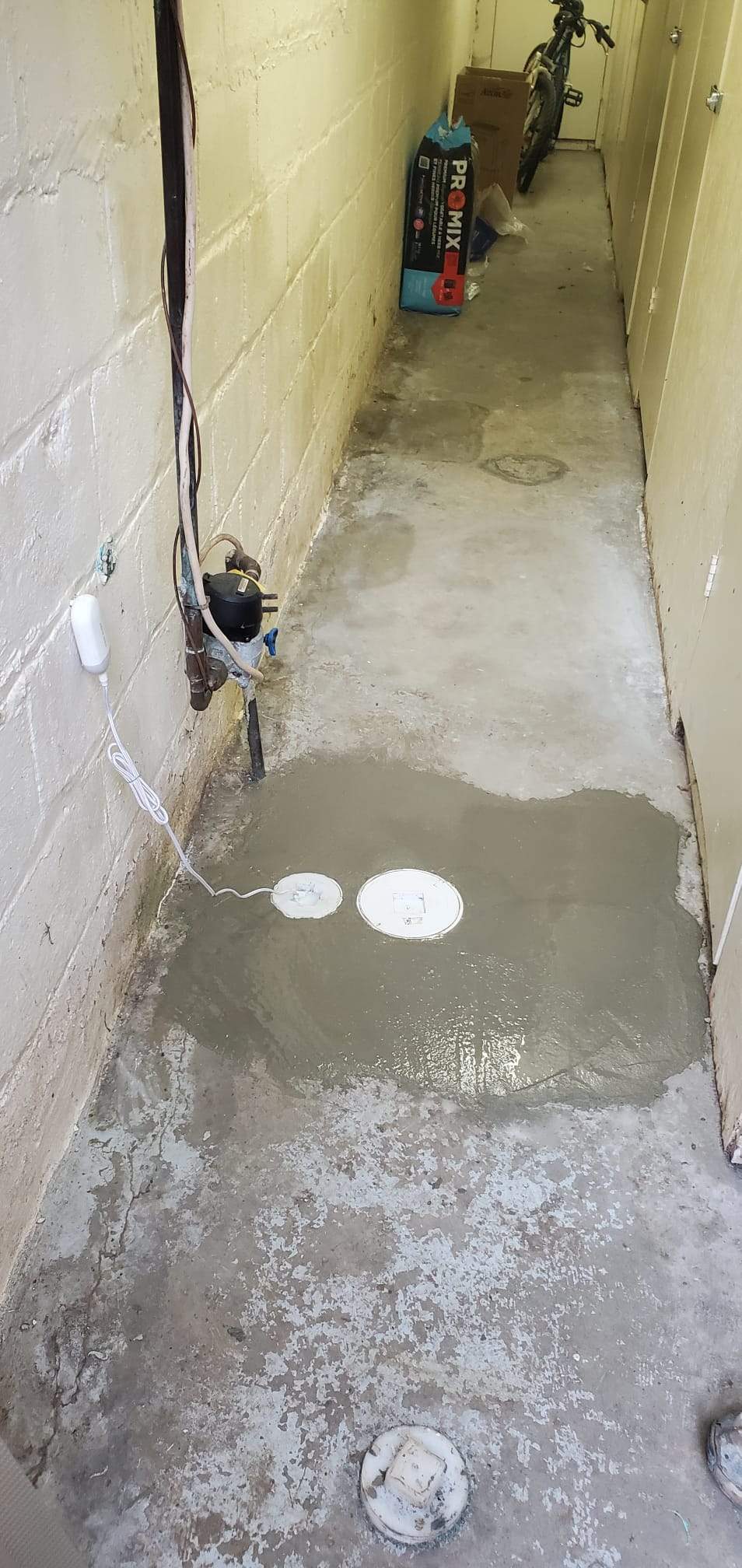 Backwater Valve Installation and Concrete Floor Repair in Toronto by Canada Waterproofers Inc