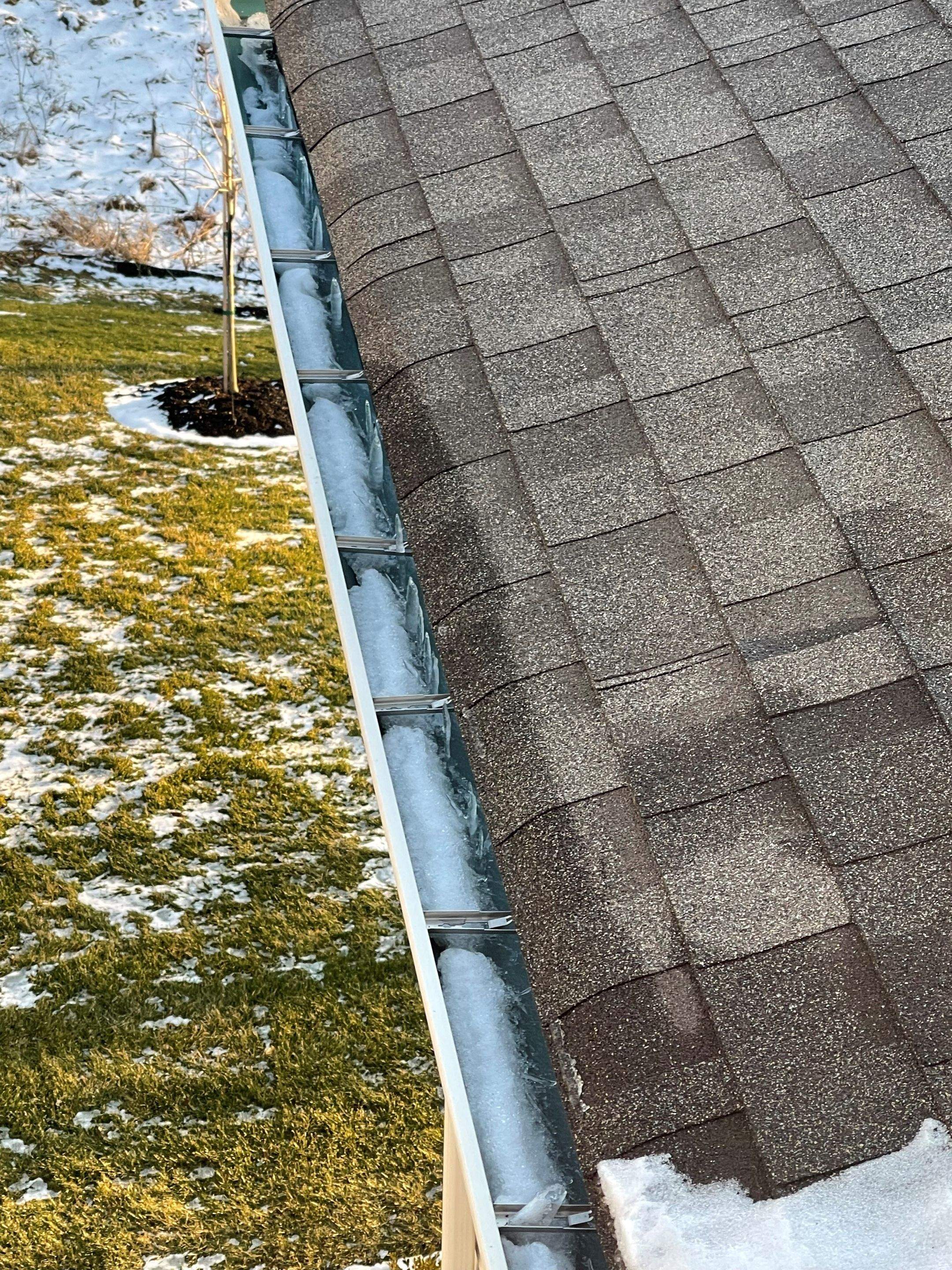 Icedamn Heat Cables and gutter guards by Absolute Roofing and Construction