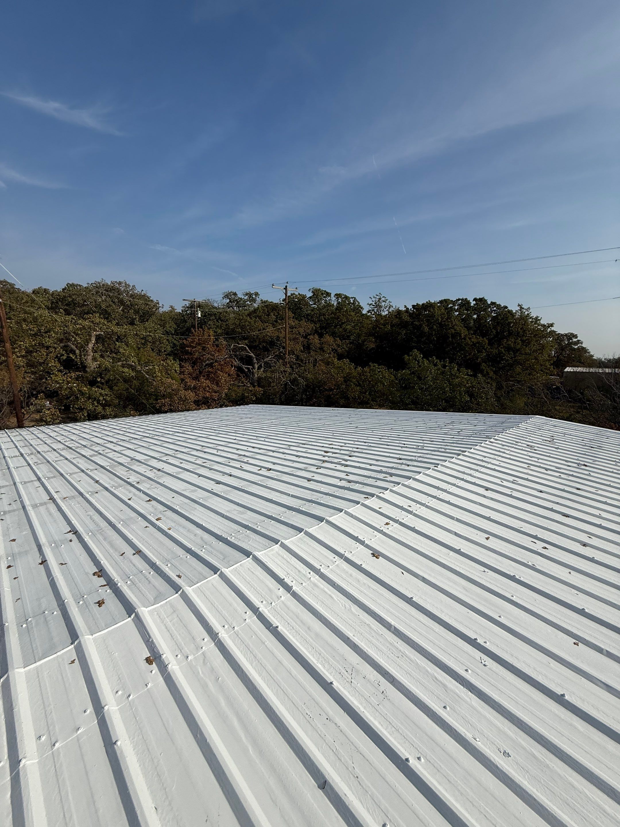 Silicone Coating Metal Rehab by First Out Roofing 