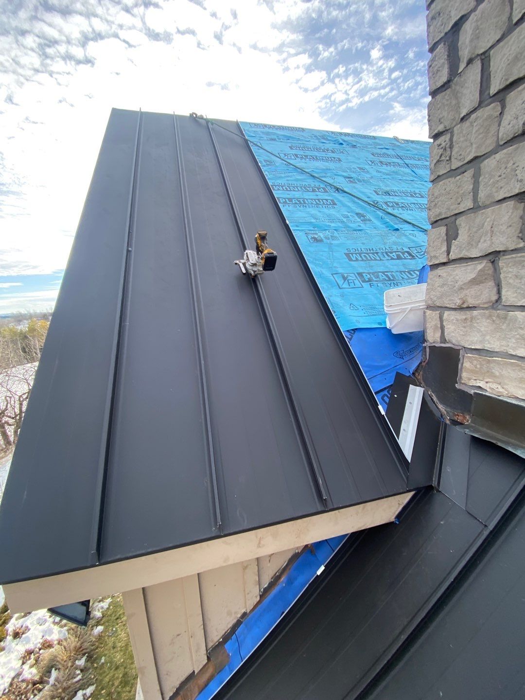 Residential Roofing Installation using 24 Ga Standing Seam Metal by Jay Carter Roofing & Sheet Metal