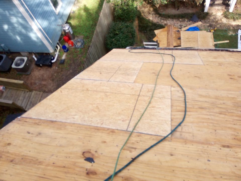 Residential Roofing Installation using Roof Replacement by American Roofing & Construction LLC