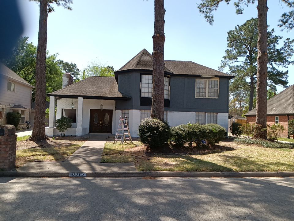 Interior and exterior painting project by Roof Concepts Construction