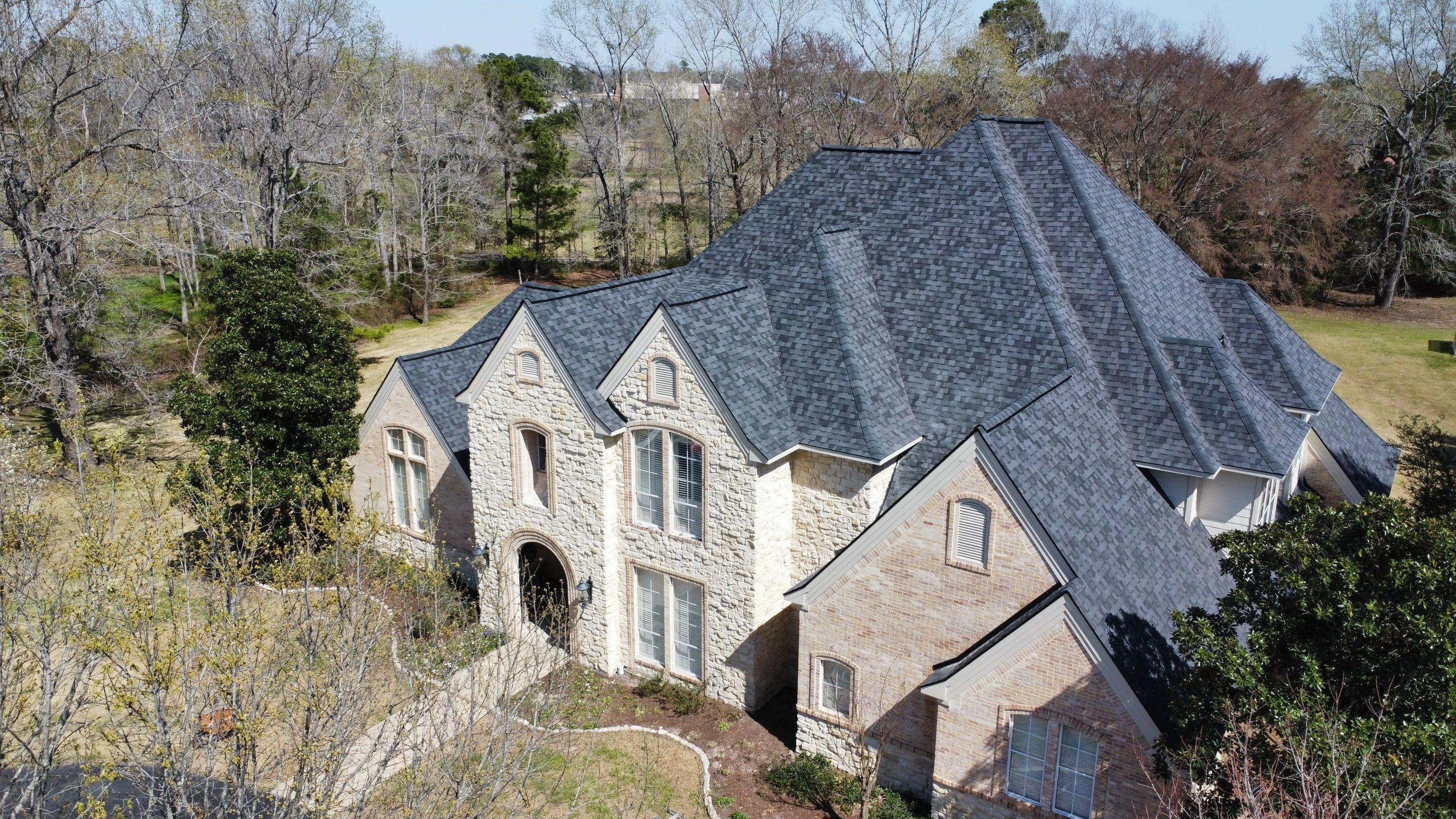 Landmark Moire Black by First Out Roofing 