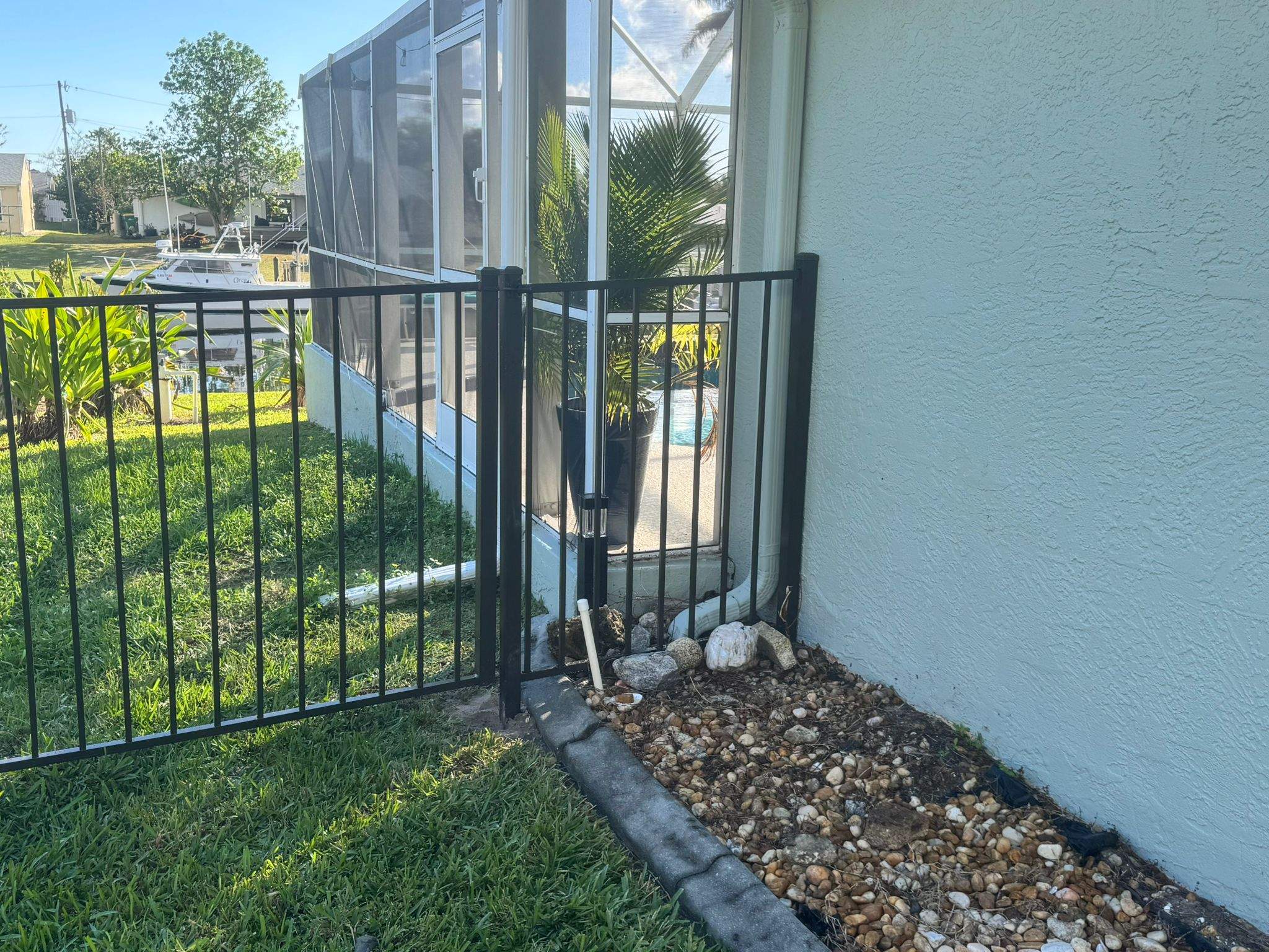 Bronze Aluminum Picket Fence Installation in Port Charlotte by True Fence LLC