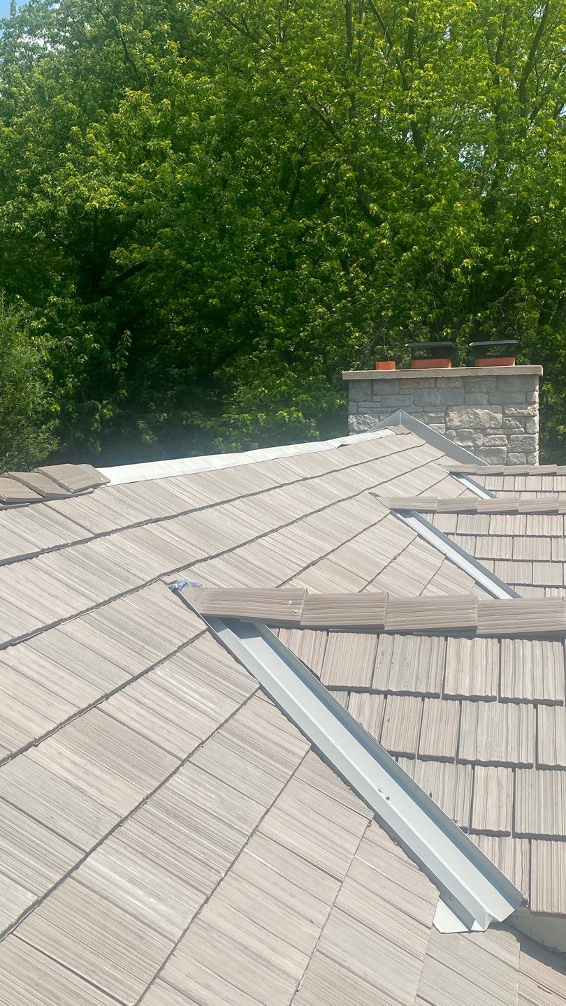 DaVinci Roof Installation with Snow Guards in Oconomowoc Lake by Custom Installations