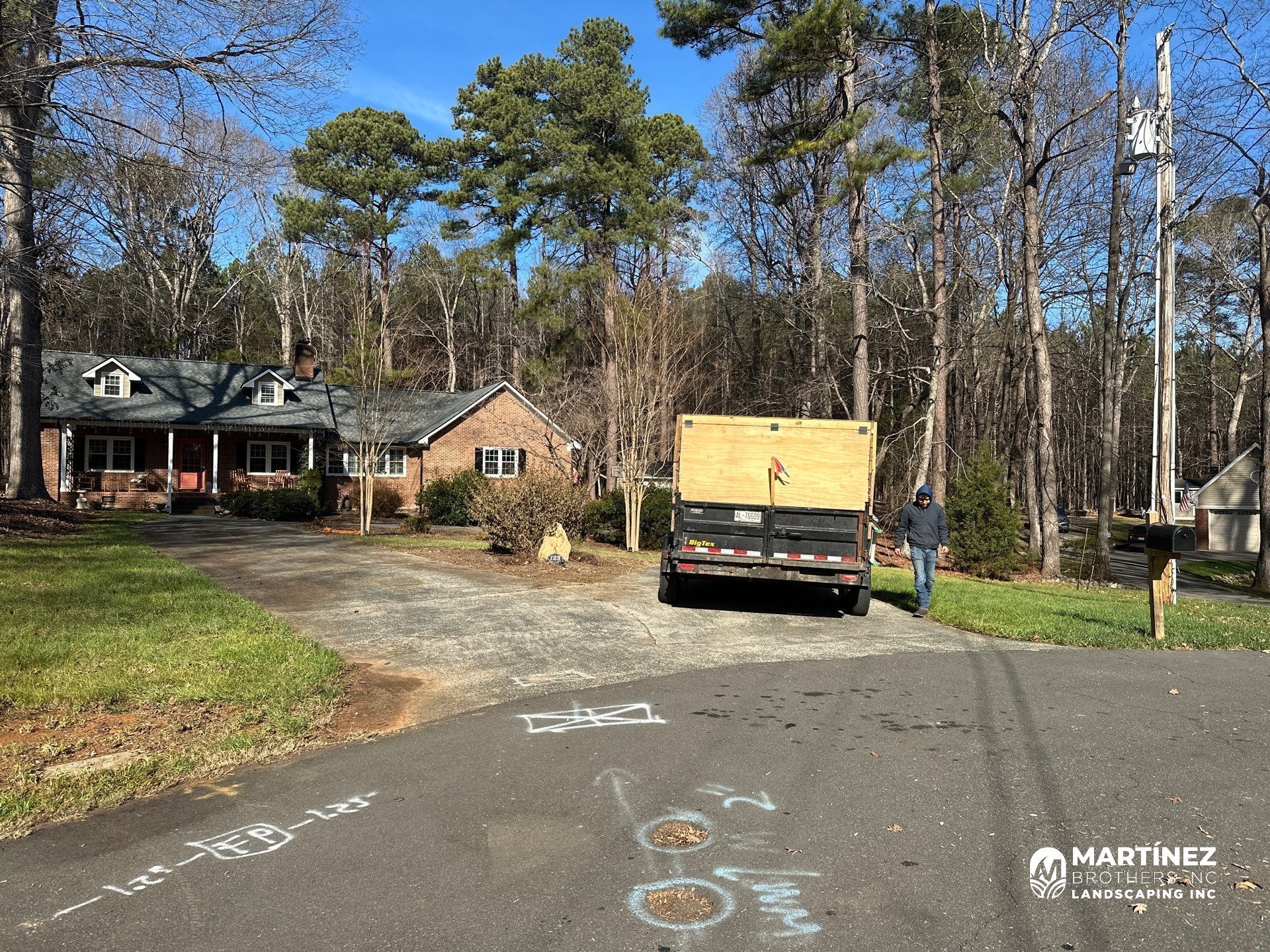 Leaf removal from gutters and yard by Martinez Brother’s Nc Landscaping Inc