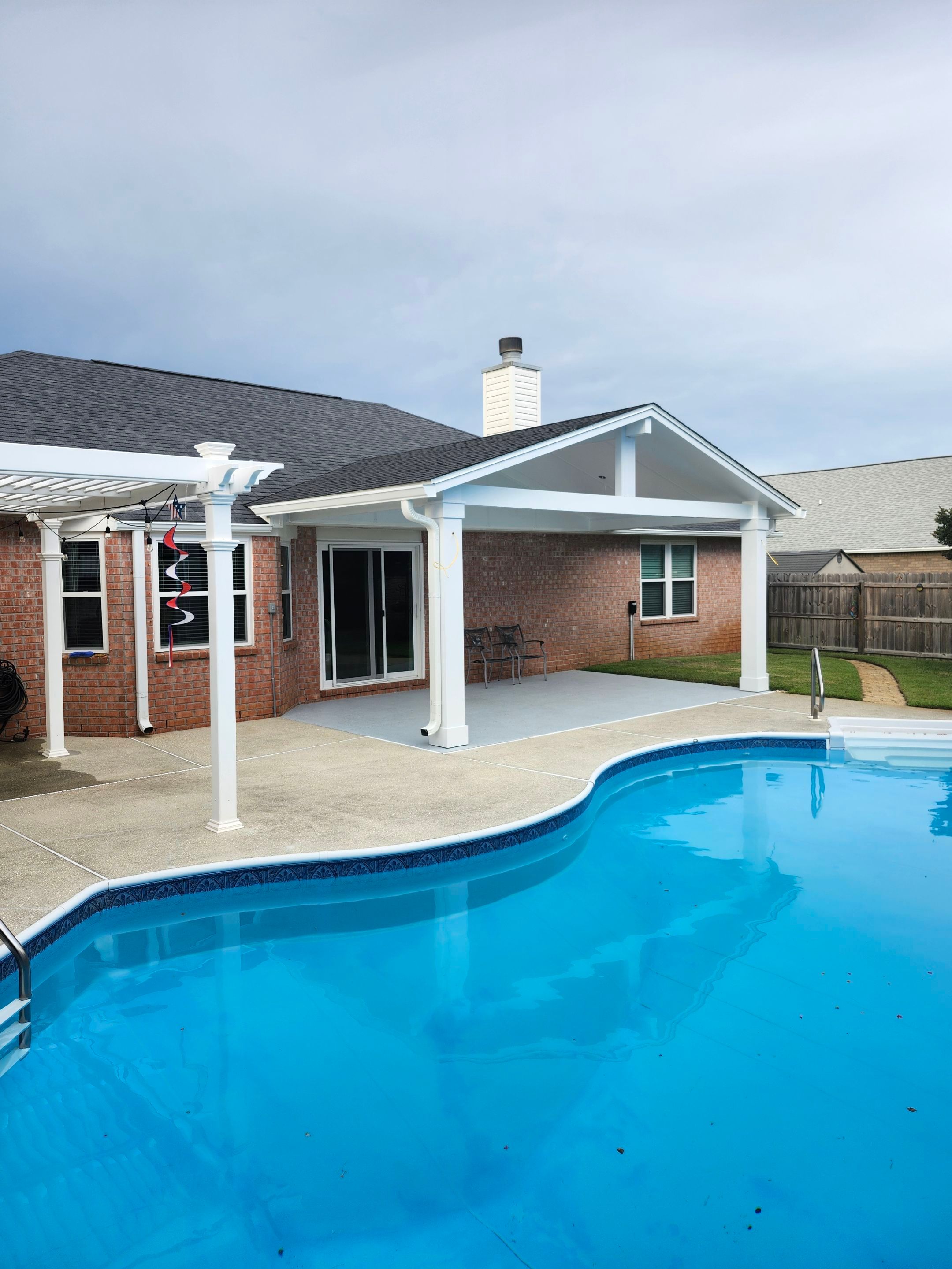 Poolside Cathedral Patio Cover by Titan Sunrooms