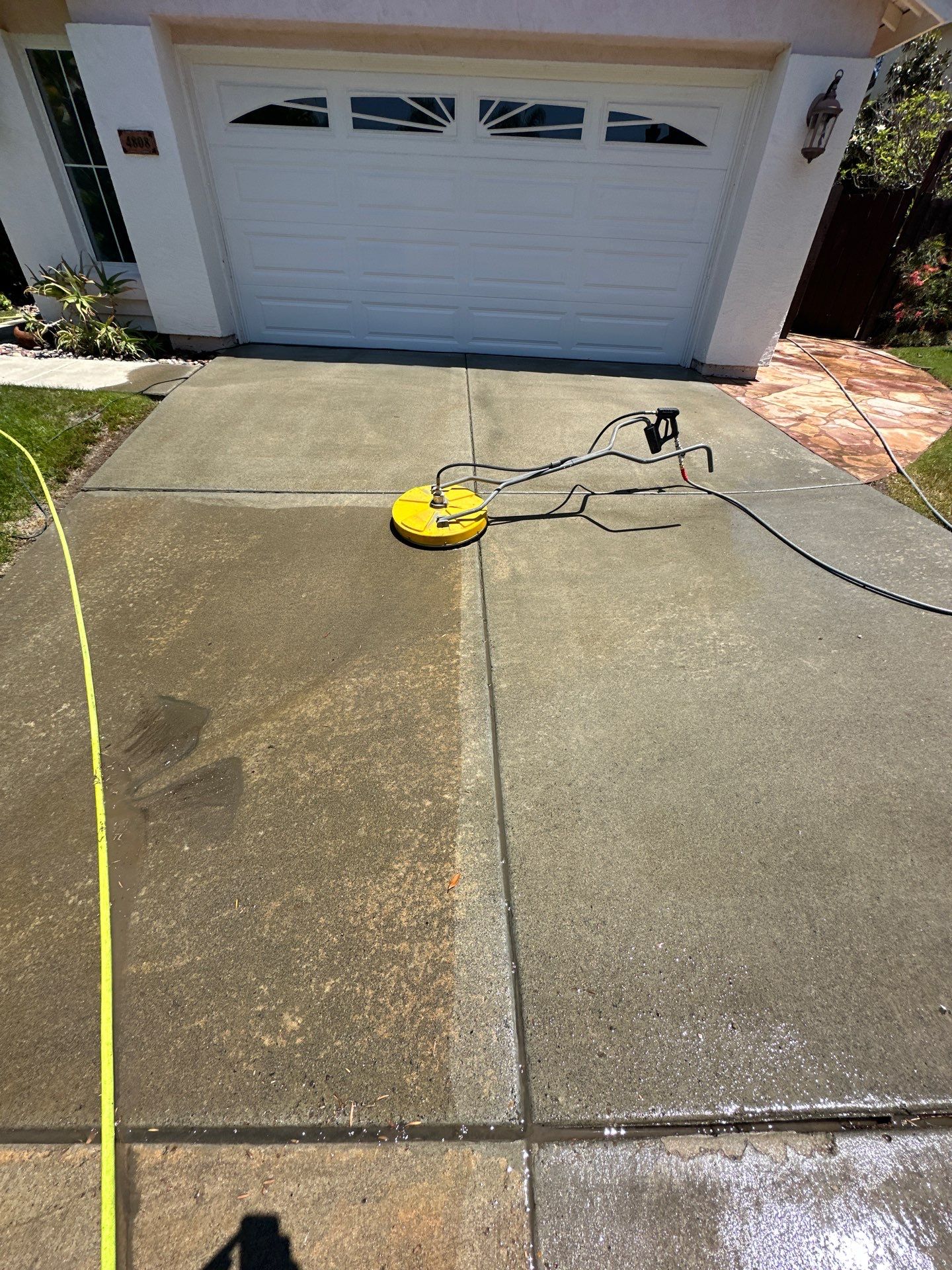 House Washing, Concrete Cleaning, and Window Washing with a Side of Gutters by Property Cleaning Experts