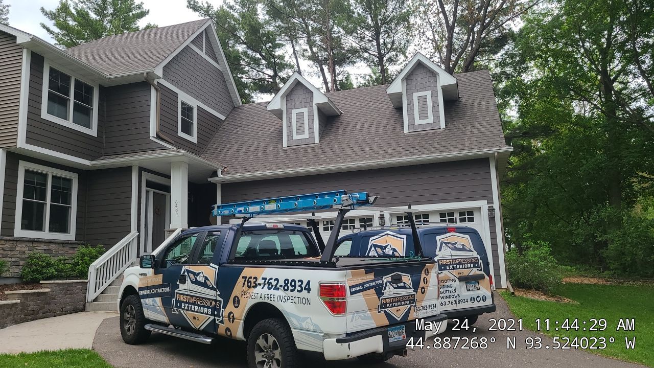 Chanhassen, MN – Roof Replacement with Gutter Guard Upgrade by First Impressions Exteriors