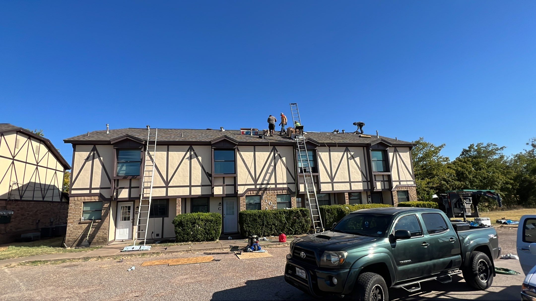 Commercial Roofing Installation using ATLAS Pinnacle Pristine Shingles by Harvey Roofing & Construction