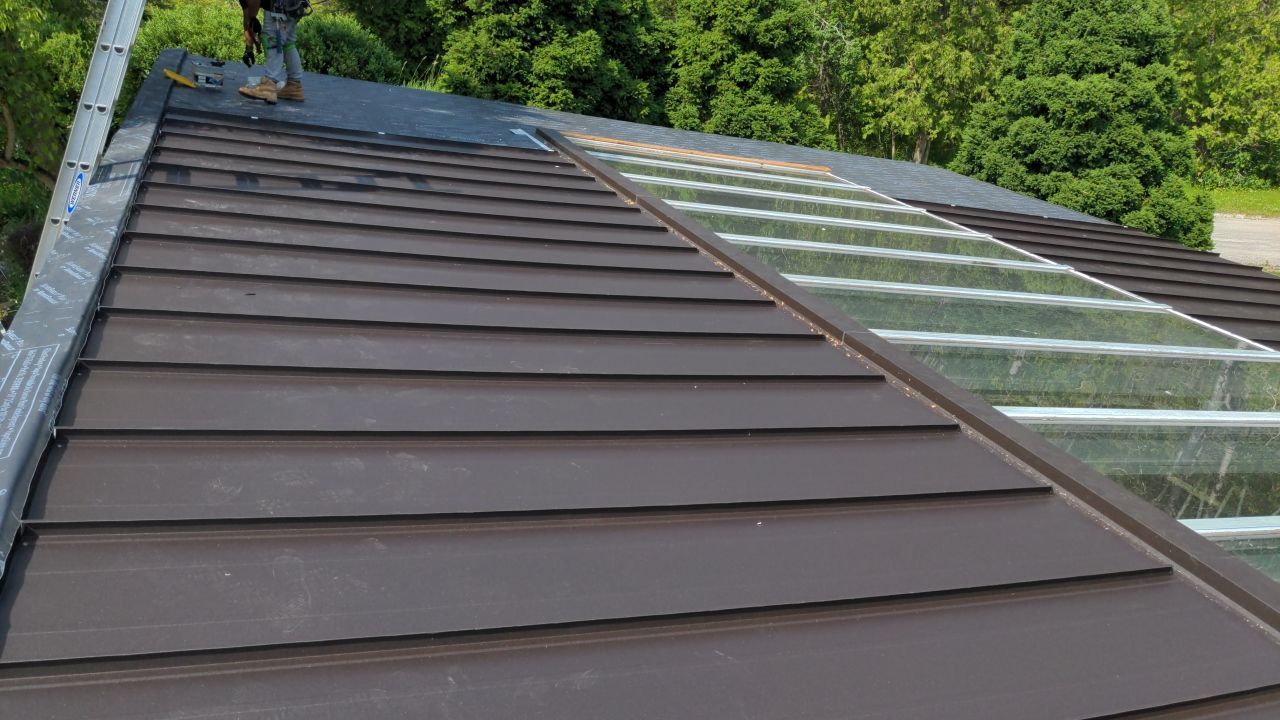 Roof Replacement using 16" Standing Seam Panels by Jay Carter Roofing & Sheet Metal