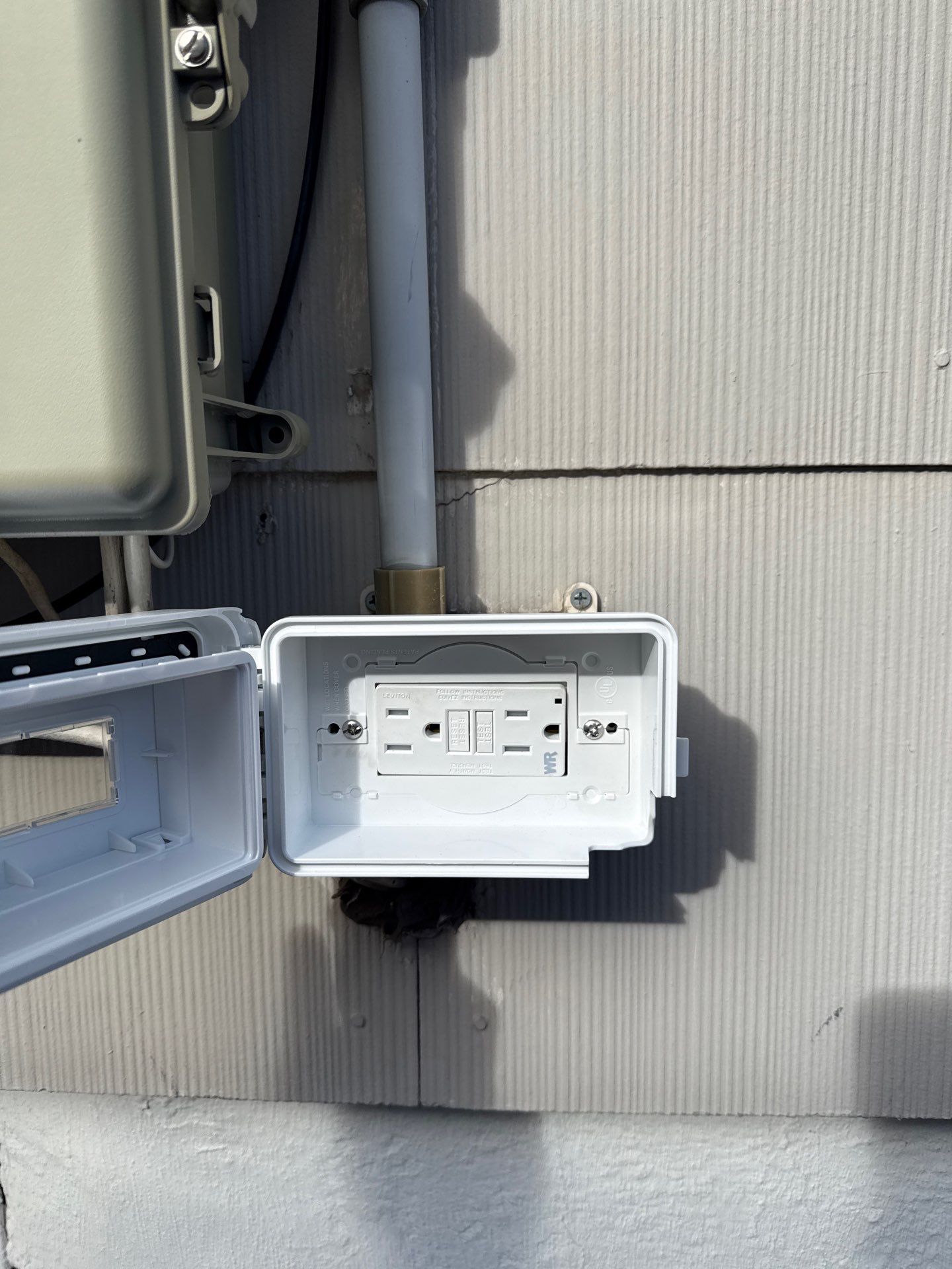 Outdoor Outlet Replacement by Spartan Home Pros