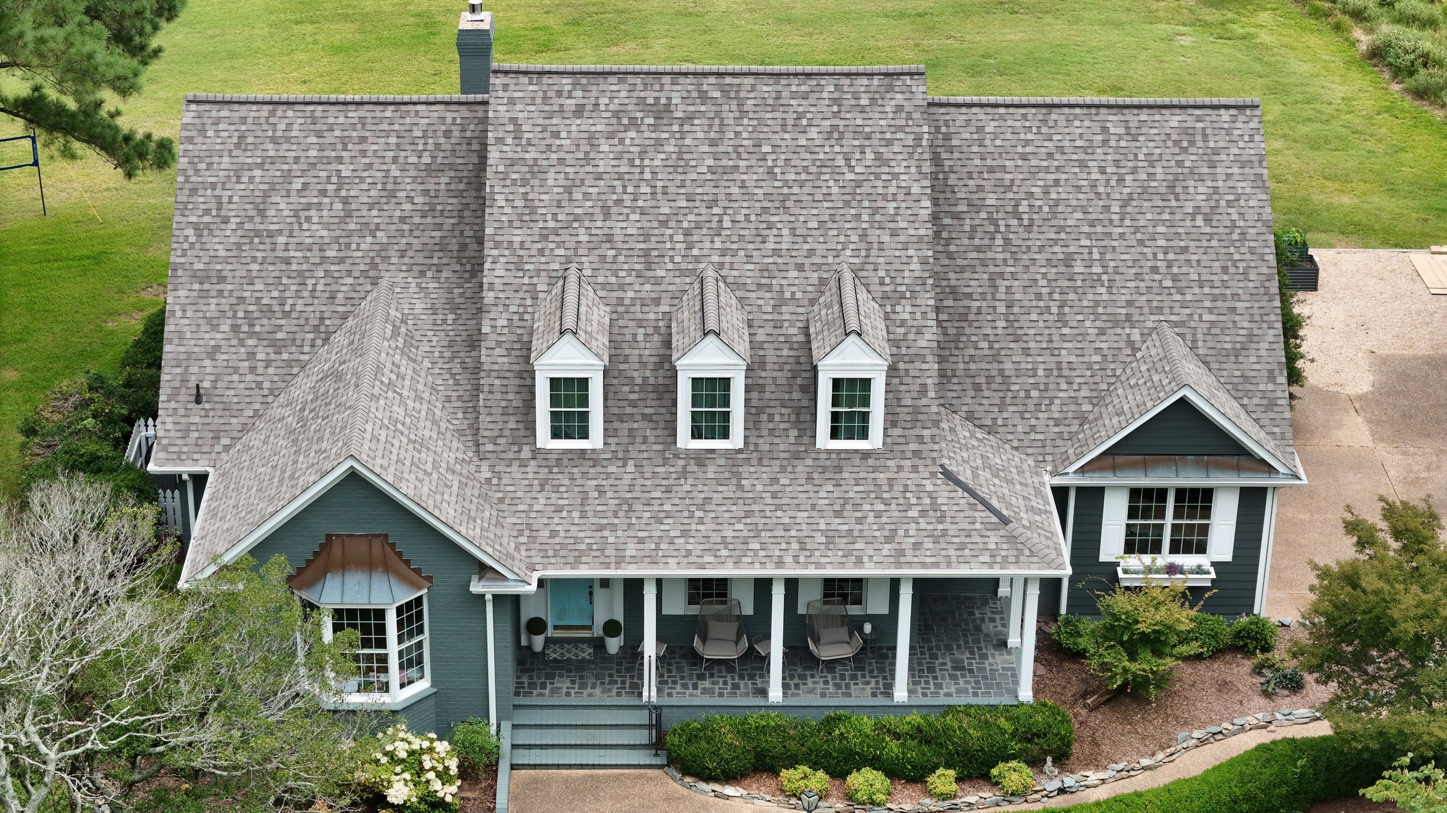 Roof Replacement and White Gutter Installation in Gloucester by Cade Construction