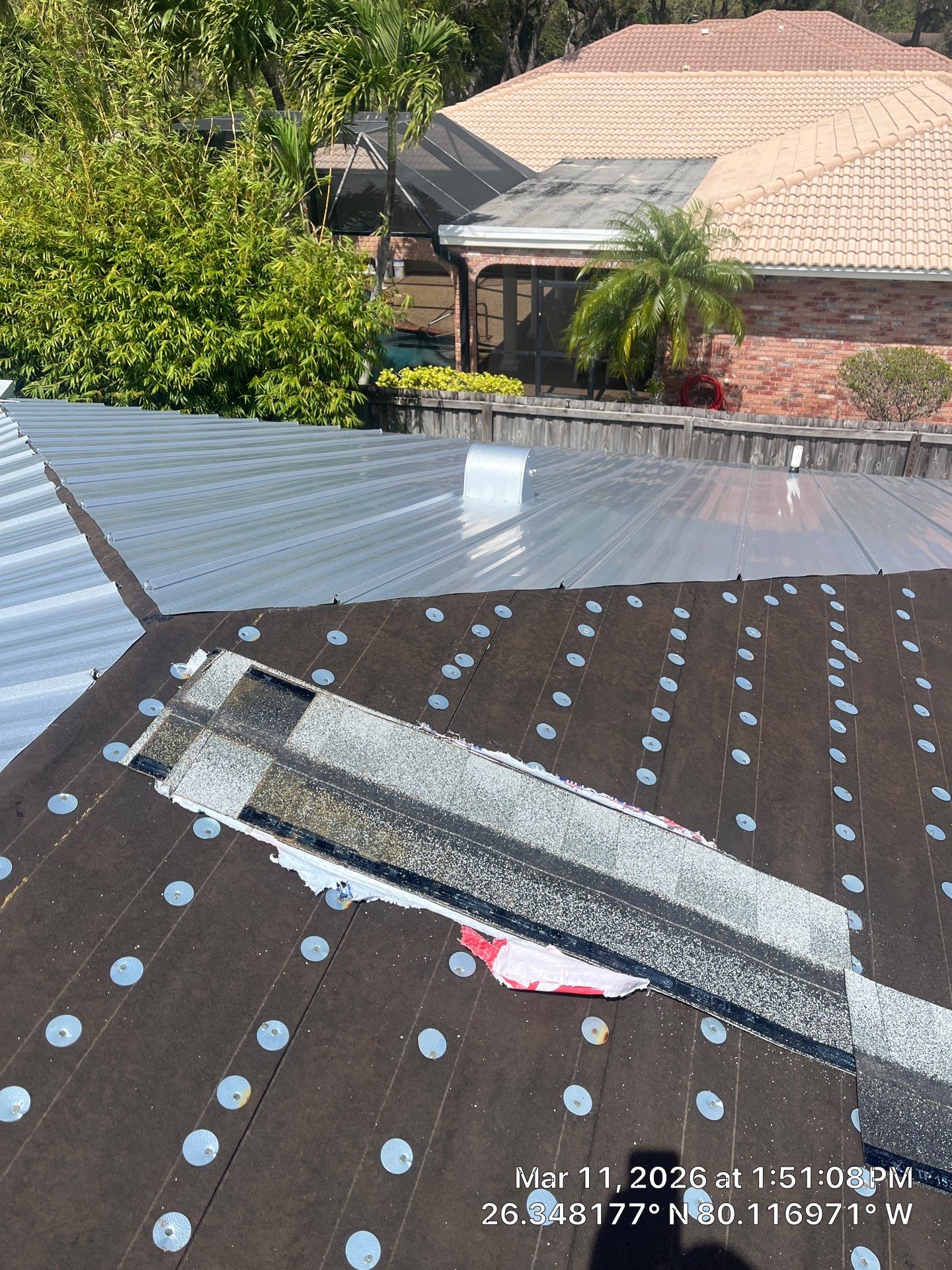 Residential Roofing Installation using 1" Nail strip metal roof by BLUES BROTHERS ROOFING